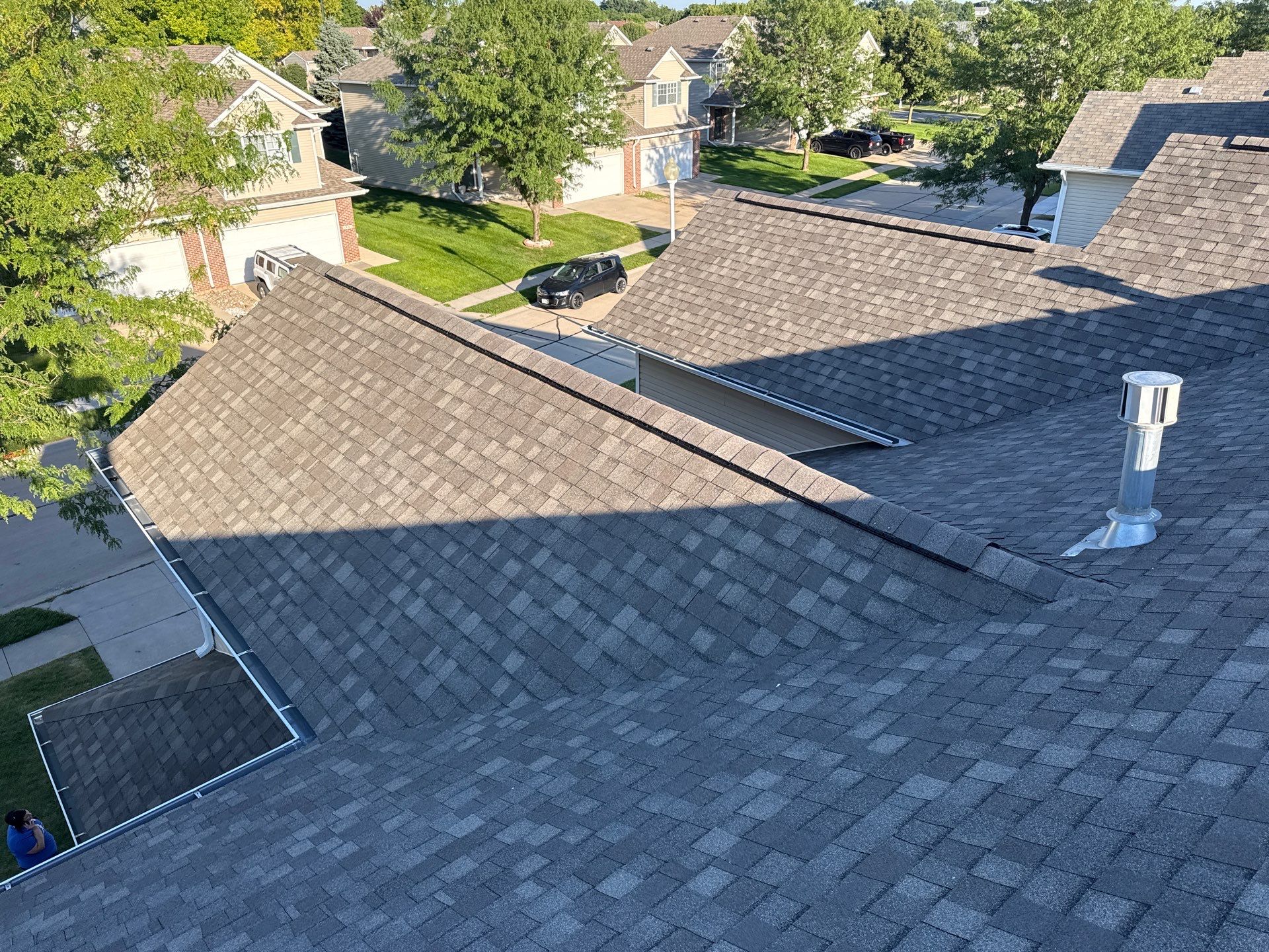 Residential Architectural Shingle Roof Replacement and Gutter Upgrade in Lincoln by Star Home