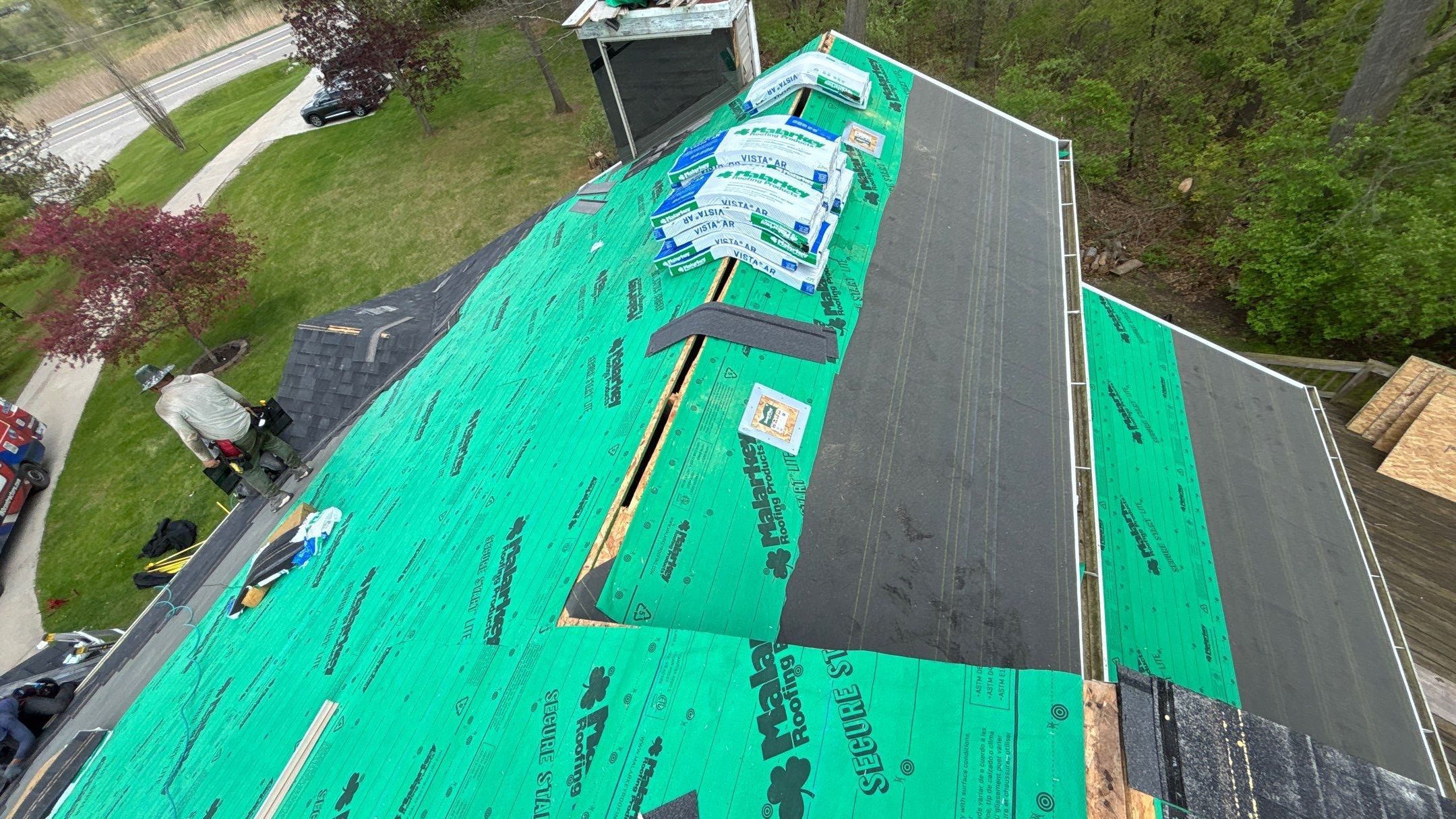 Roof Replacement using Malarkey Vista Brilliant Black by 180 Contractors