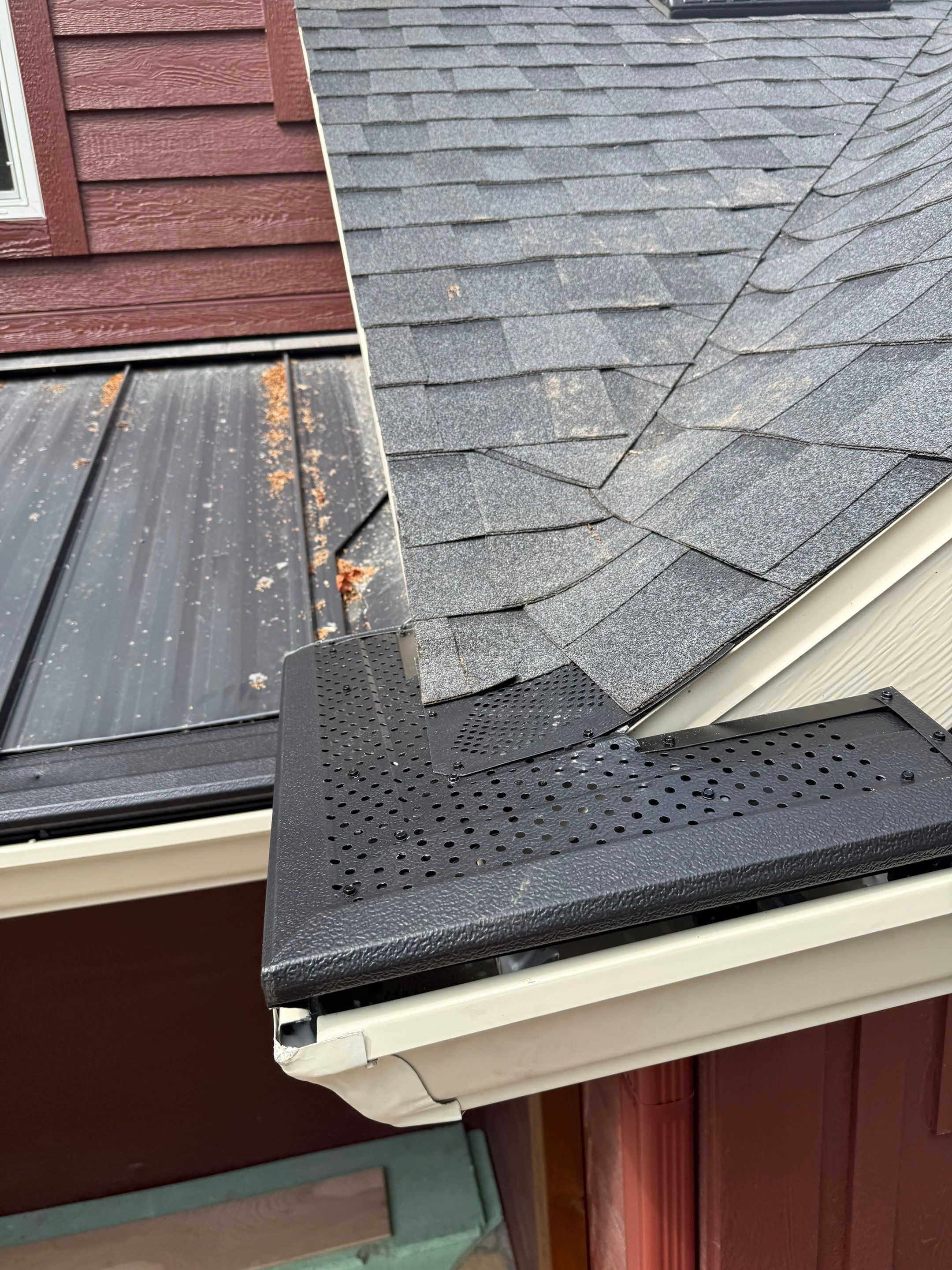 Gutter and Gutter Helmet Installation for Charlevoix Residential Project by Rainbow Seamless Systems