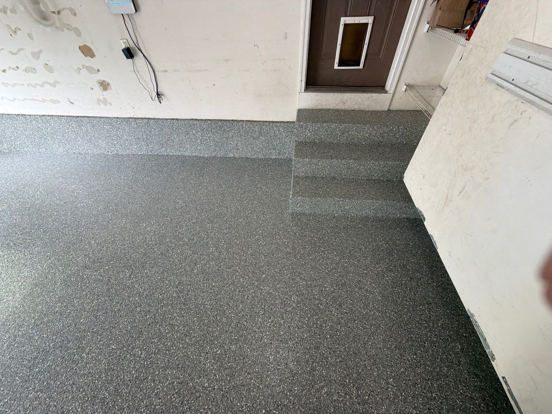 Custom Grey Flake Epoxy Garage Floor and Step Coating in Norton Shores by Gordon Painting