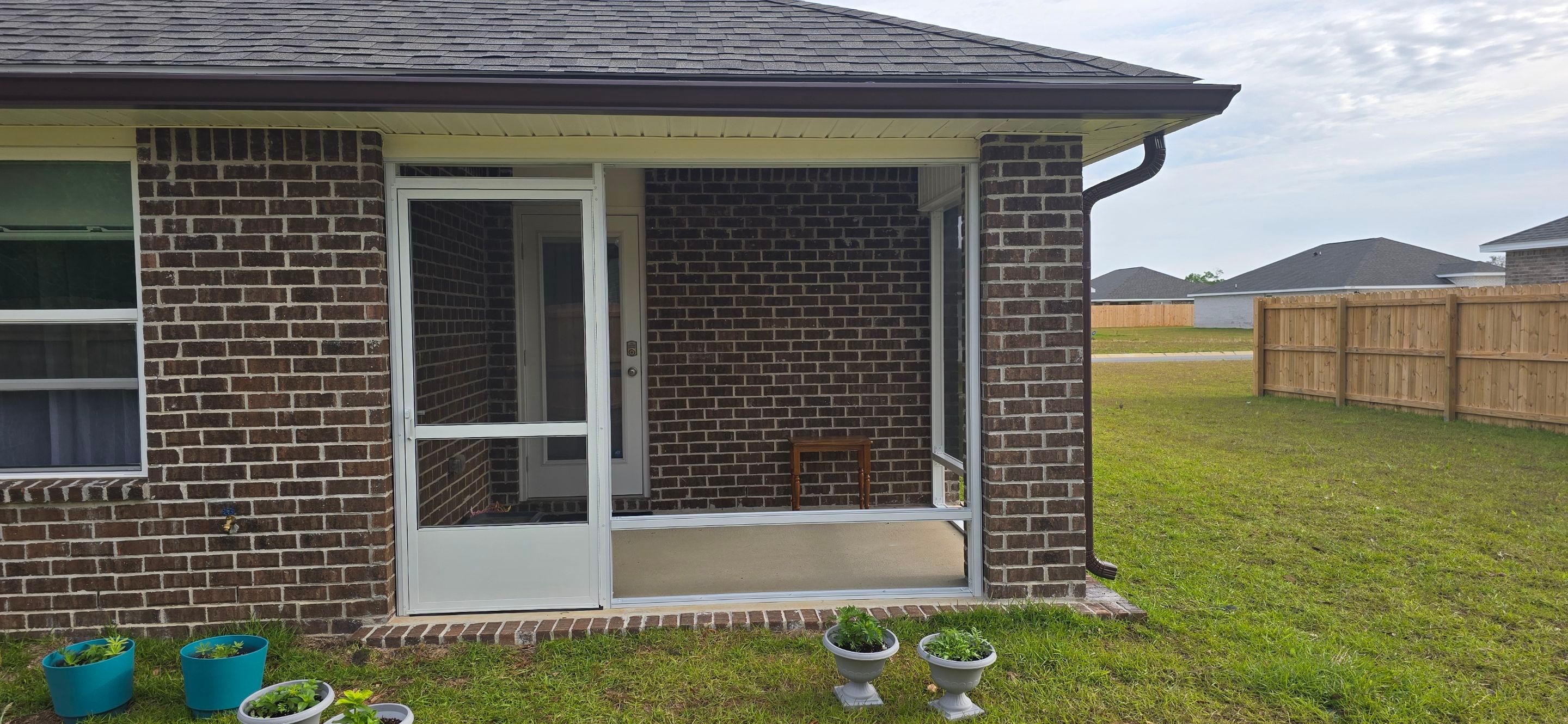 Screen Room Under Existing Roof in Milton by Titan Sunrooms