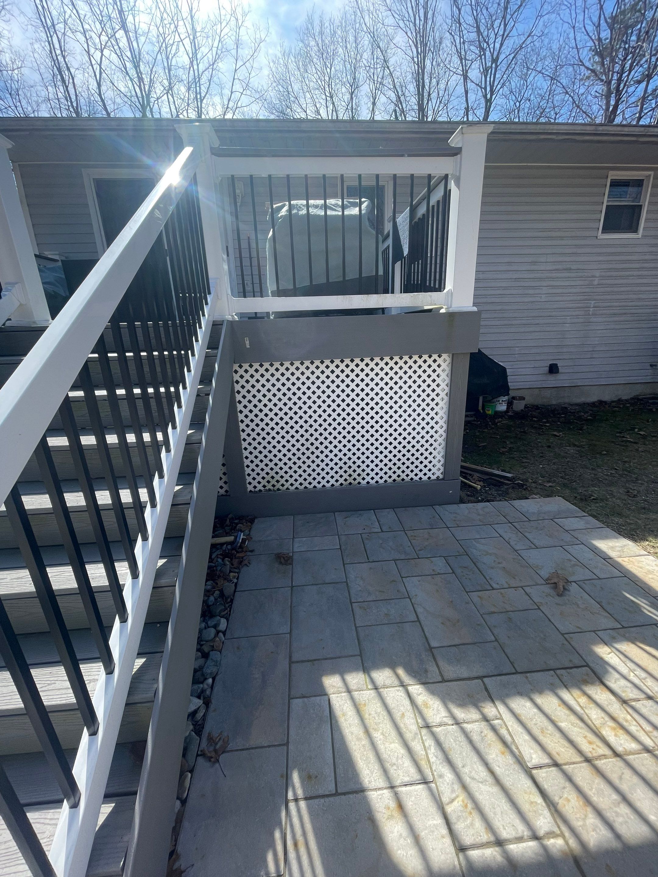 Pressure treated wood deck cleaned by SJ Exterior