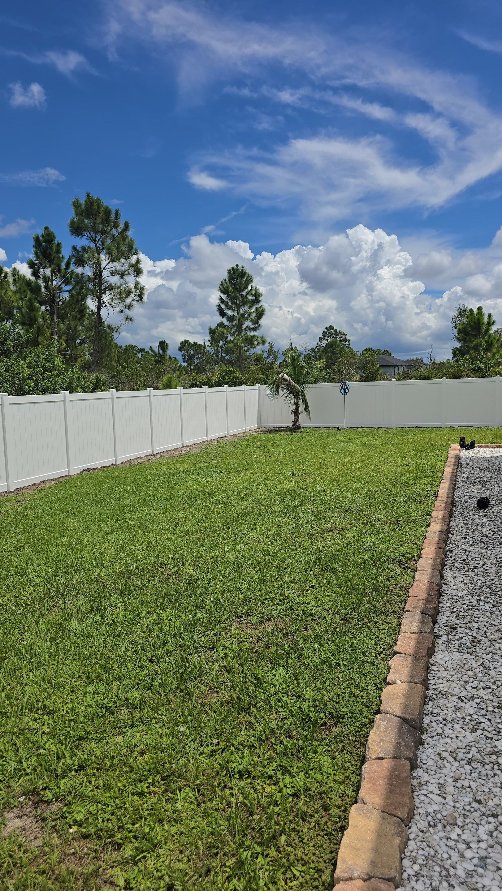 White Vinyl Privacy Fence Installation in Port Charlotte Florida by True Fence LLC
