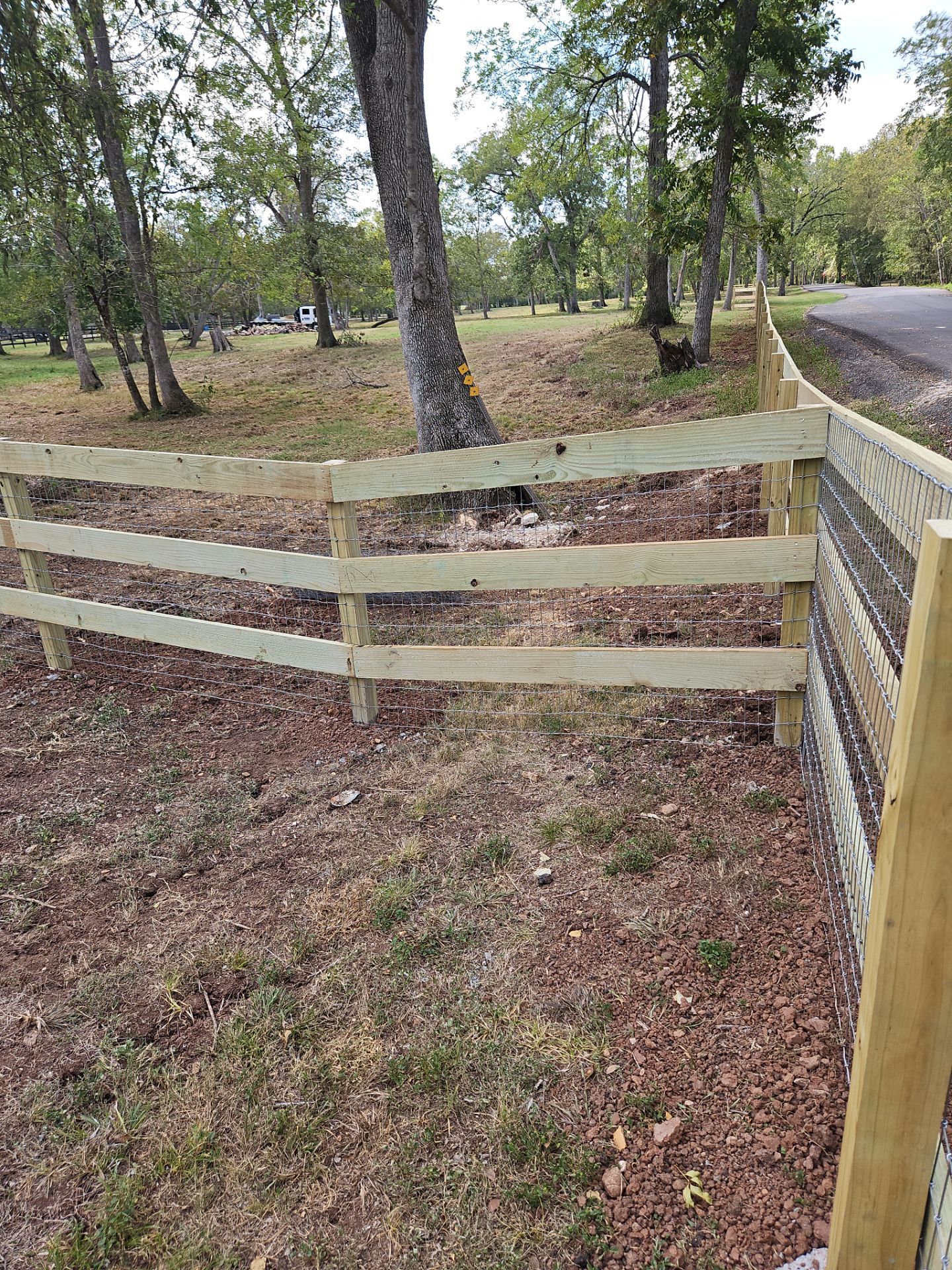Ranch Style fence Plus Iron installation by Tim's Fences