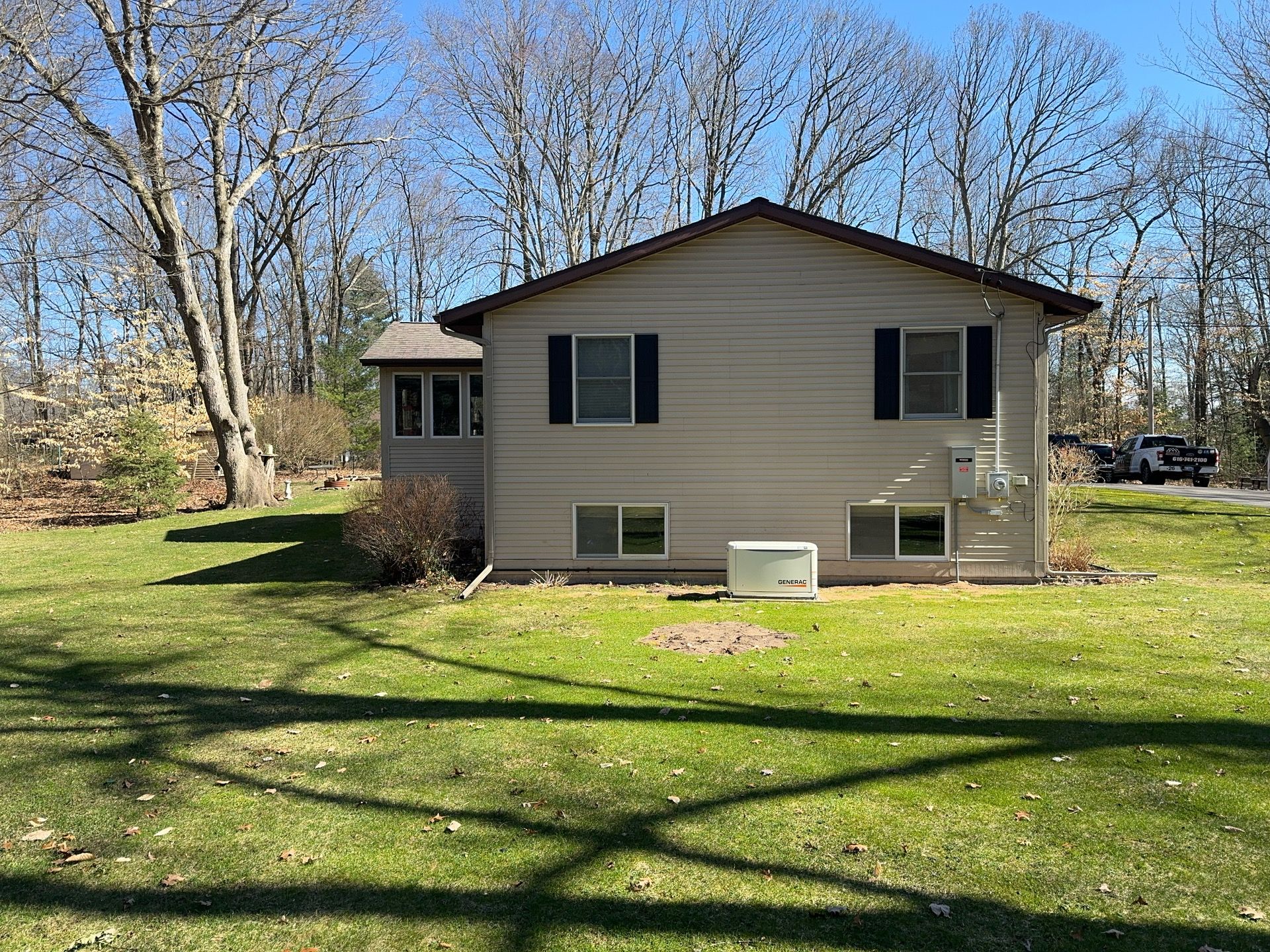 Siding, Deck and Versetta Stone by Avalon Roofing and Exteriors