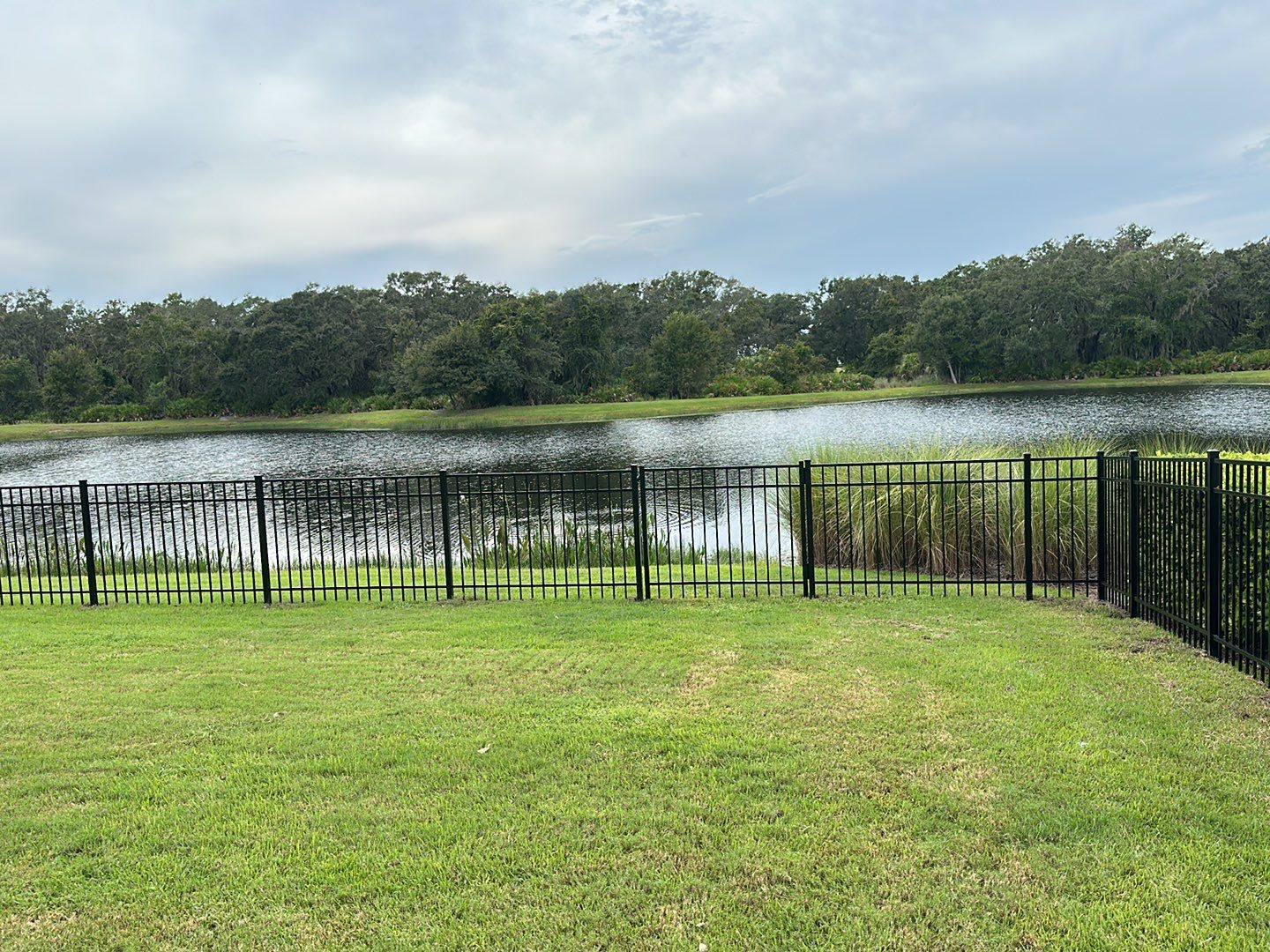 Aluminum Fence Installation using Black 3 Rail Aluminum Fence by Asap fence and gates, LLC