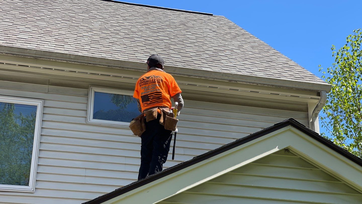 Veterans Helping Veterans – Full Roof Transformation with Owens Corning Driftwood! by Sensible Home Solutions