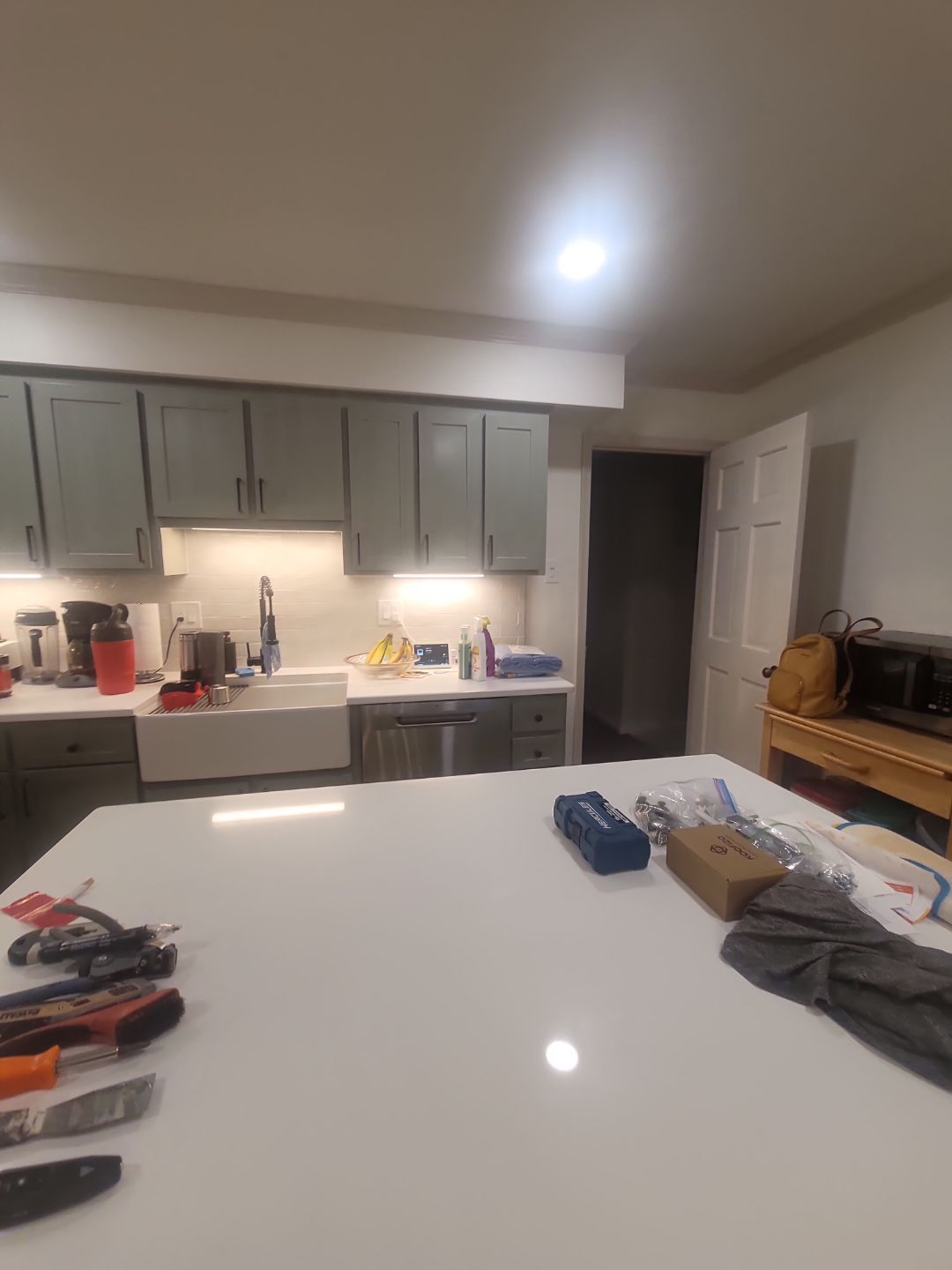 A Pathway to Personality – A Two-Tone Kitchen Transformation in Apex by Elite Remodeling and Design LLC