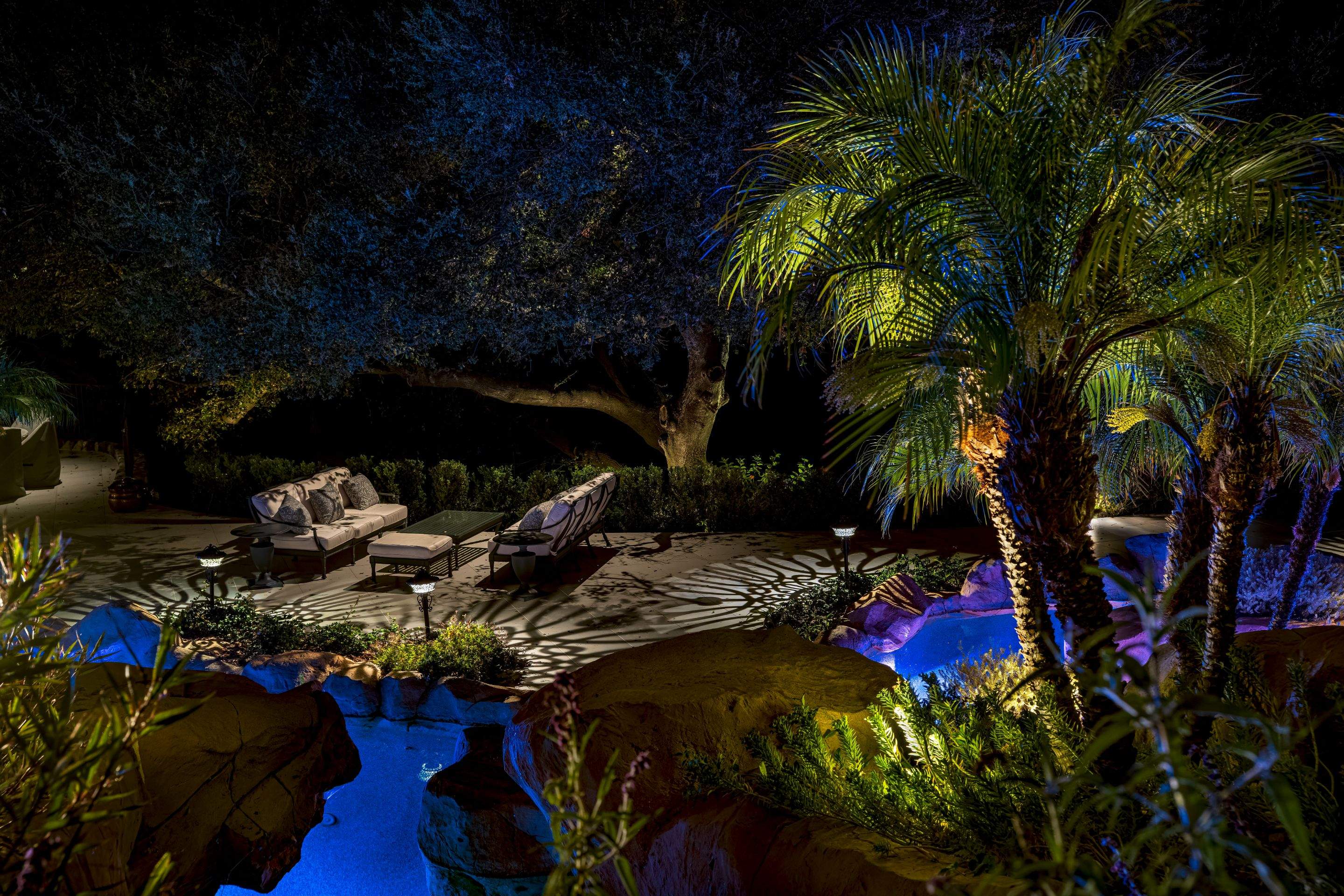 Tudor Estate Landscape Lighting with Integrated Stone Step Illumination by Outdoor Lights + Shades