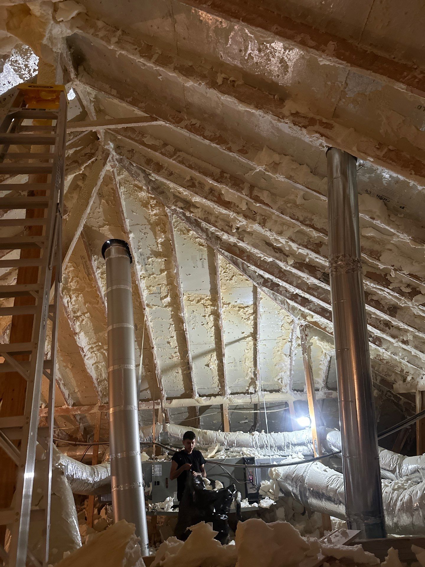 Spray foam insulation removal & re spray by Apex Insulation Solutions