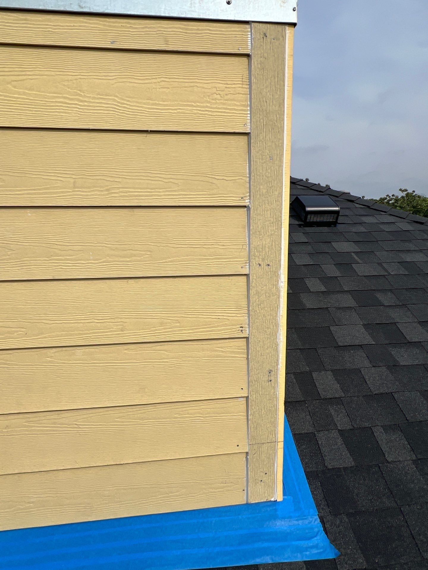 Nothing looks nicer than a little black roof by Bayfront Roofing and Construction