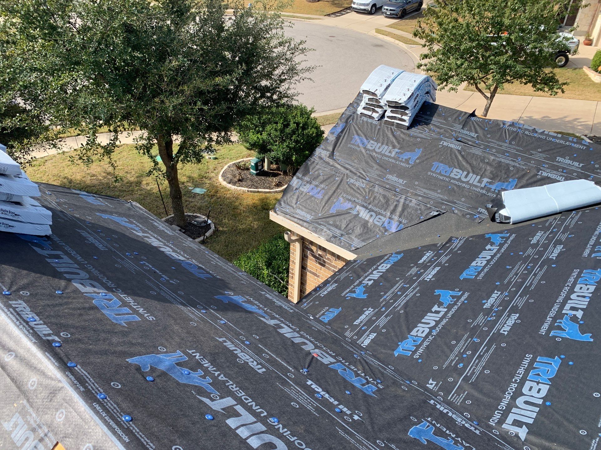 Hutto Residential Roofing Replacement with OSB Sheathing and Trim Repair by Caliber Restoration LLC