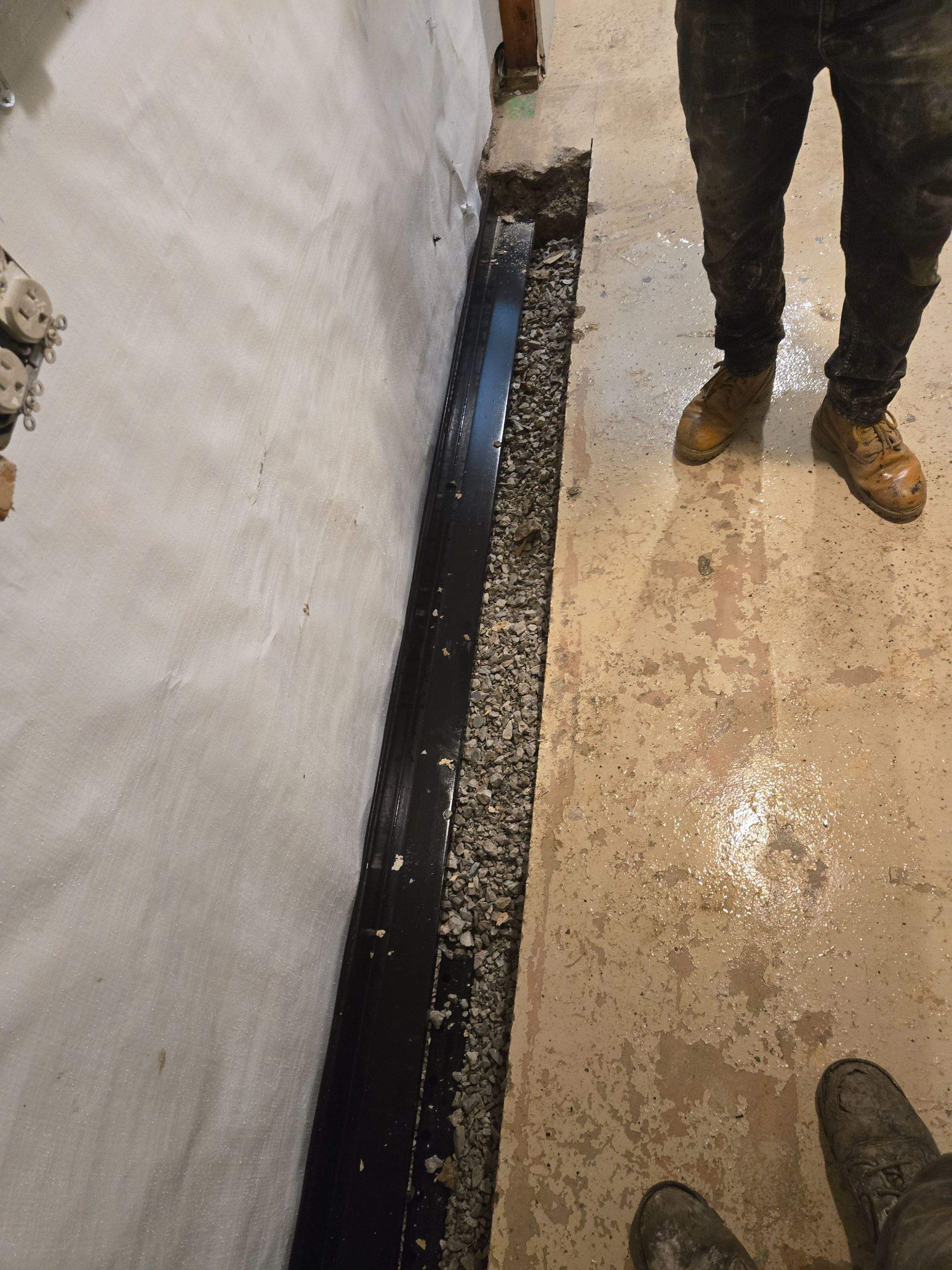 Interior Waterproofing using Drain Tile/White Cap by Allied Water Services