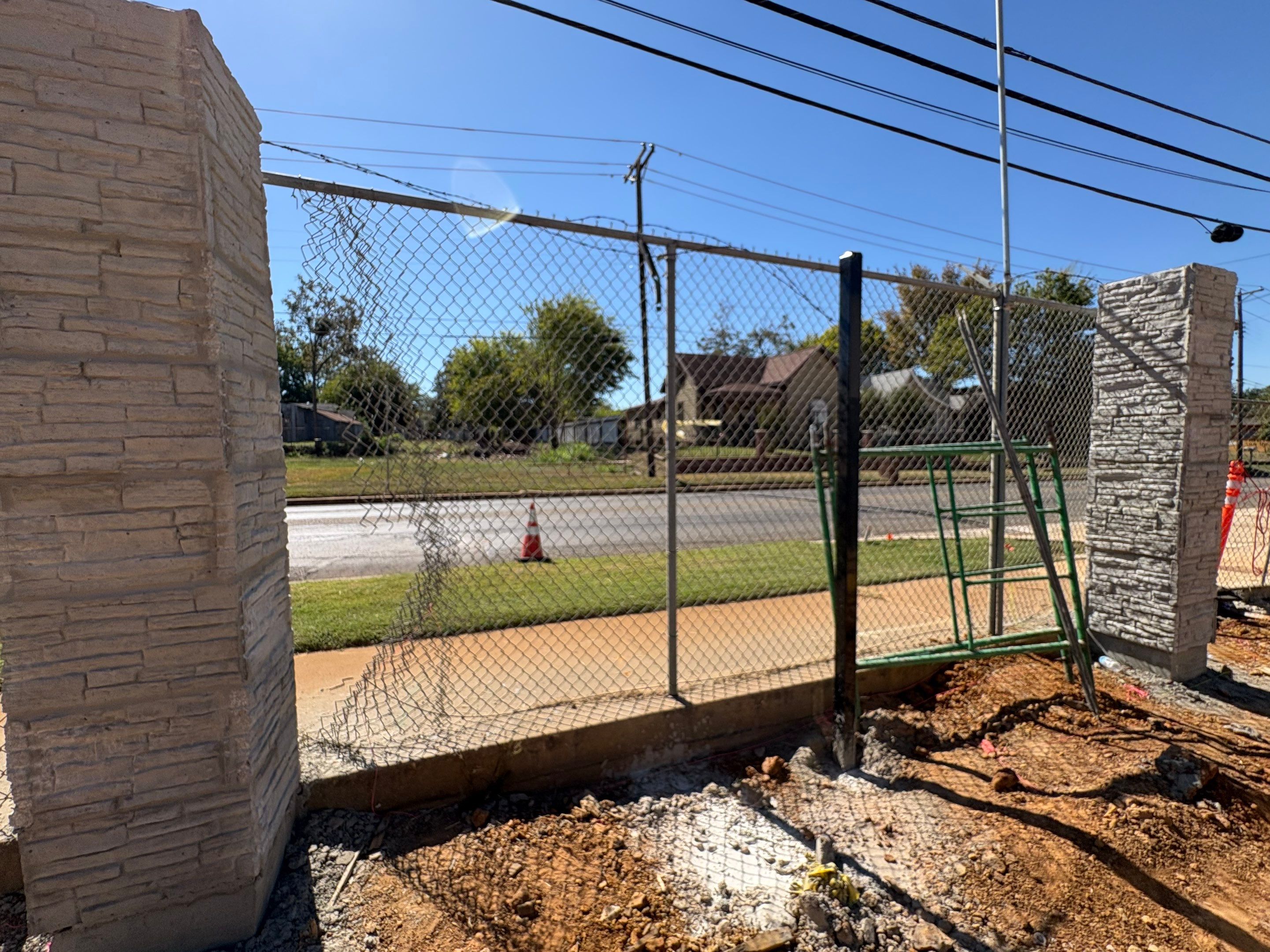 Commercial Fencing - Wrought Iron with Concrete columns by 3:16 Roofing and Construction