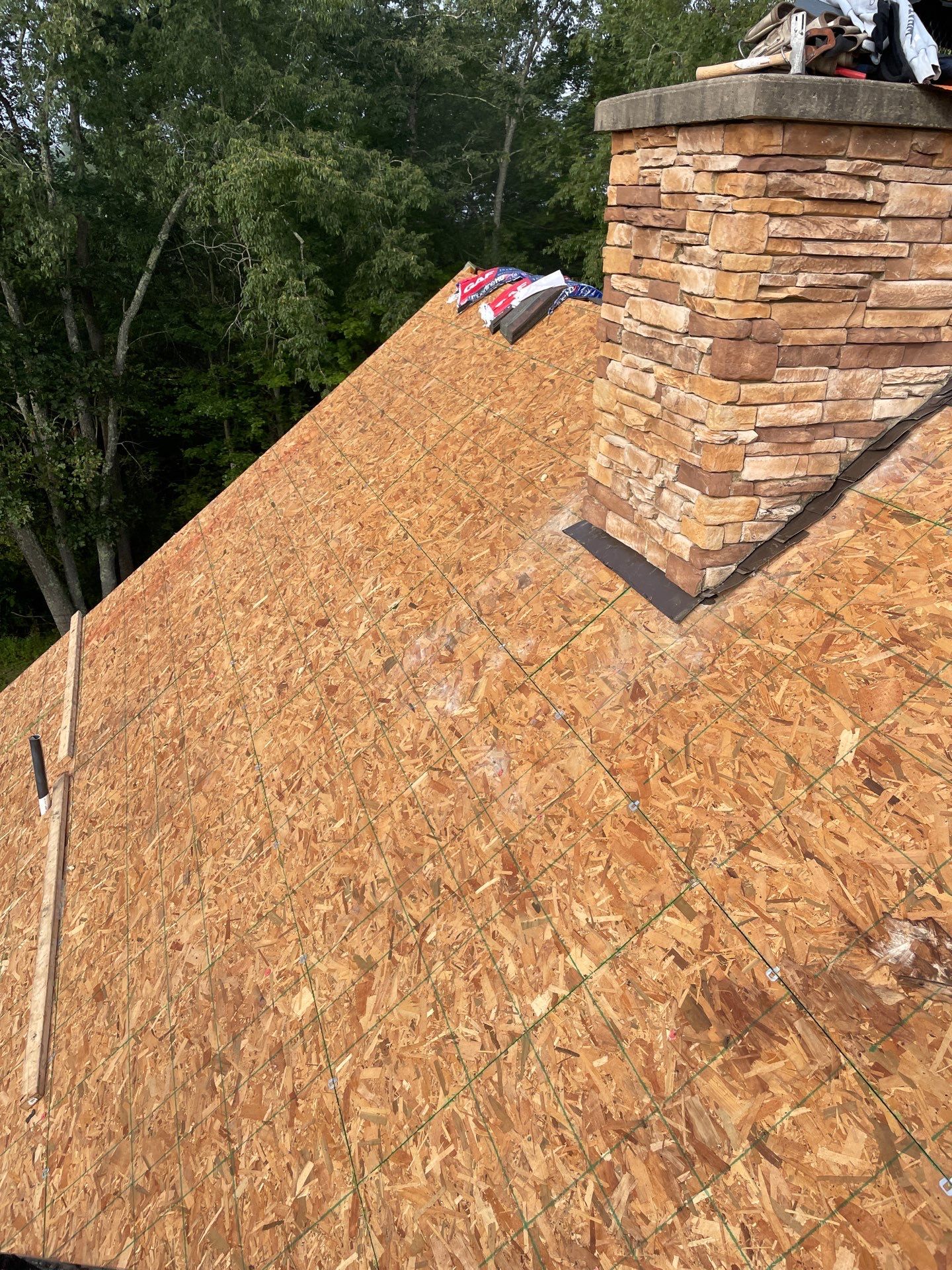 Residential Roofing Installation using GAF TImberline HDZ Hickory by Rainstoppers Roofing