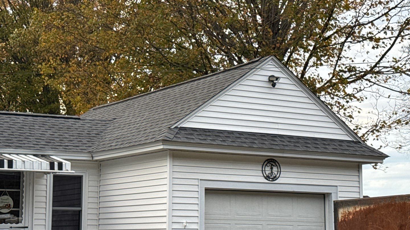 Complete Roof Replacement with GAF Pewter Gray HDZ™ Shingles, VELUX Skylights & New Gutters by Sensible Home Solutions