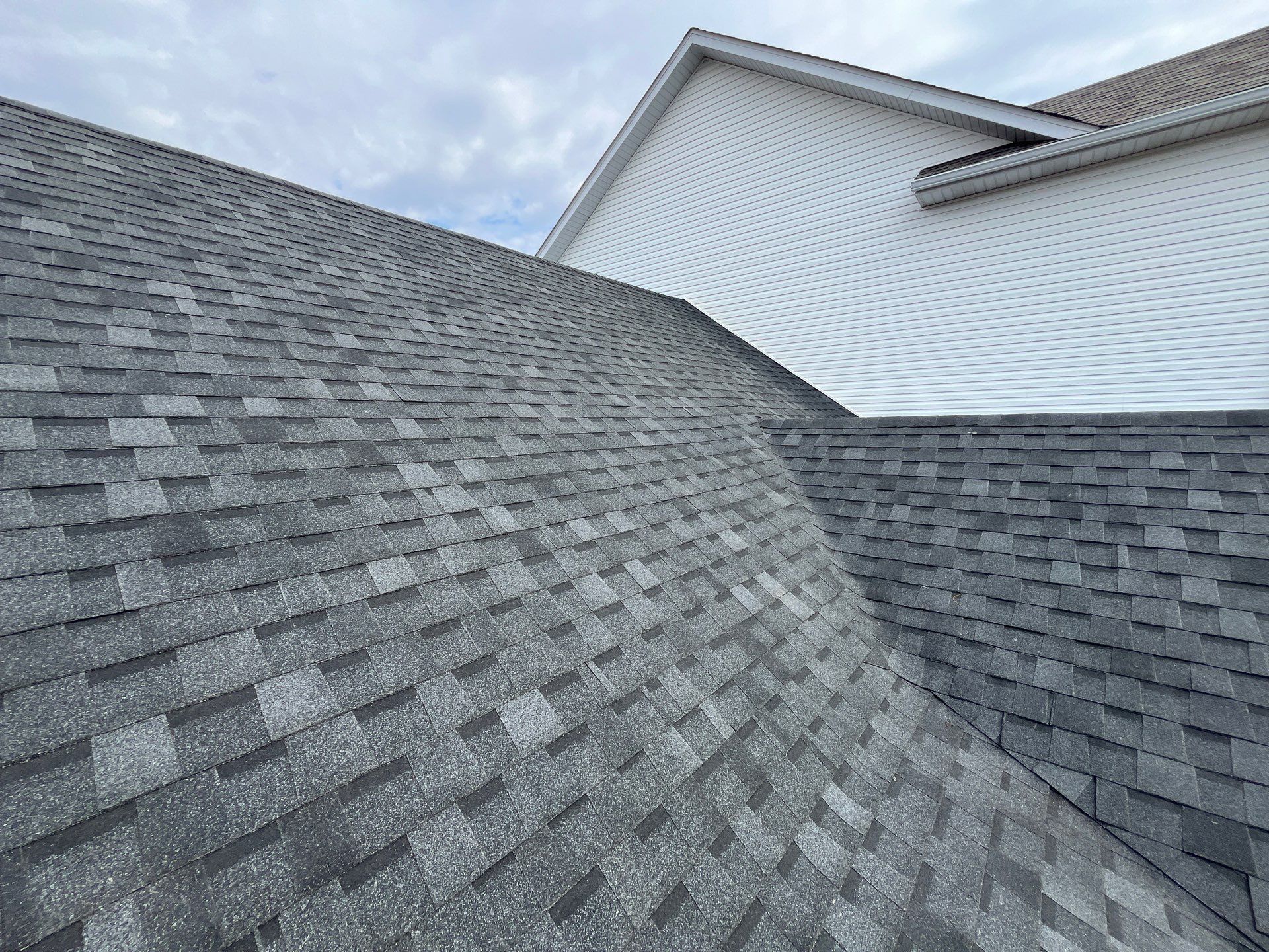 Residential Roof Replacement - Atlas Prolam Architectural Shingle - Color Black  by Titan Commercial & Residential Roofing 