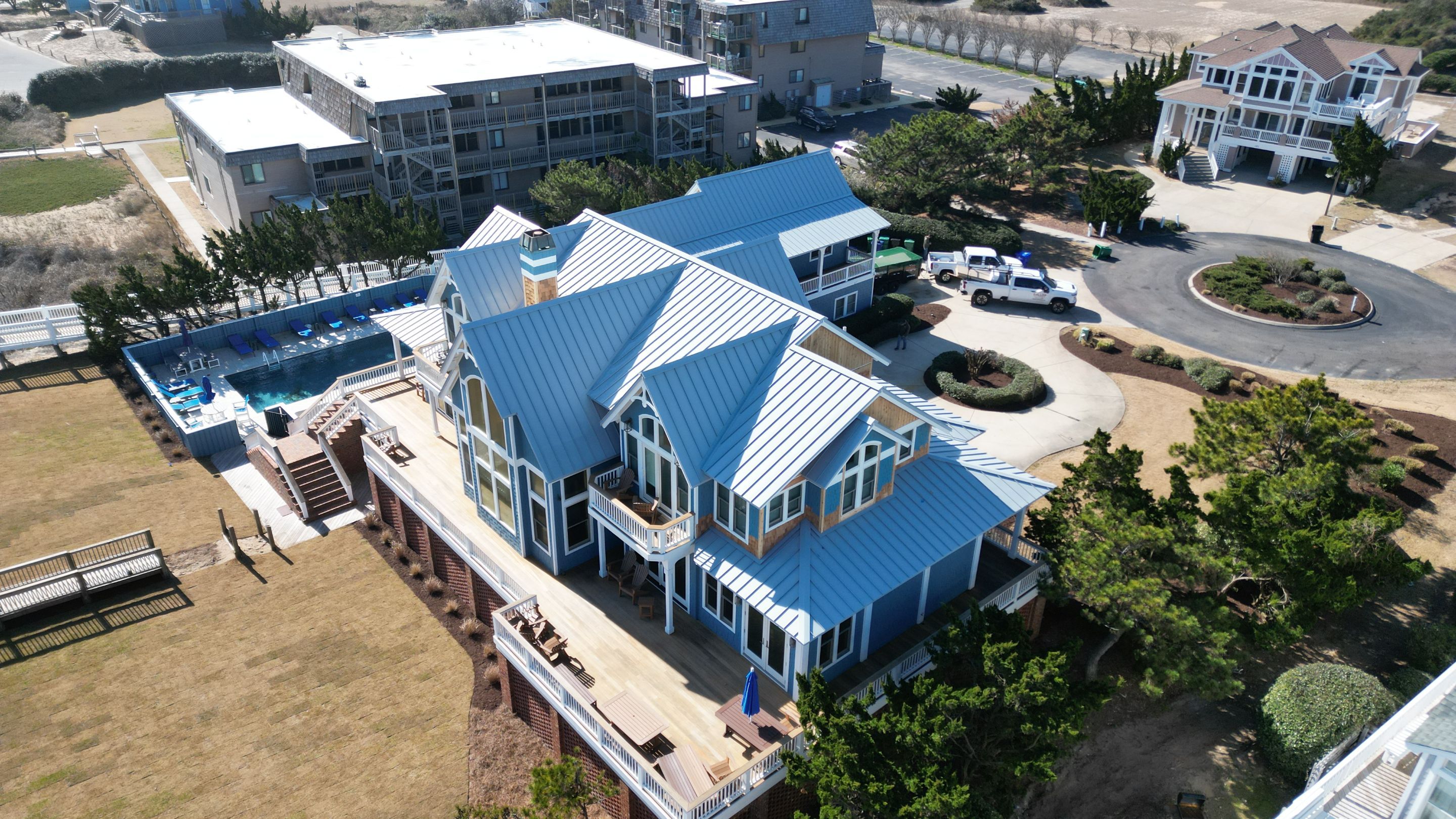 Large Metal Roof Transformation by Gallop Roofing & Remodeling, Inc.
