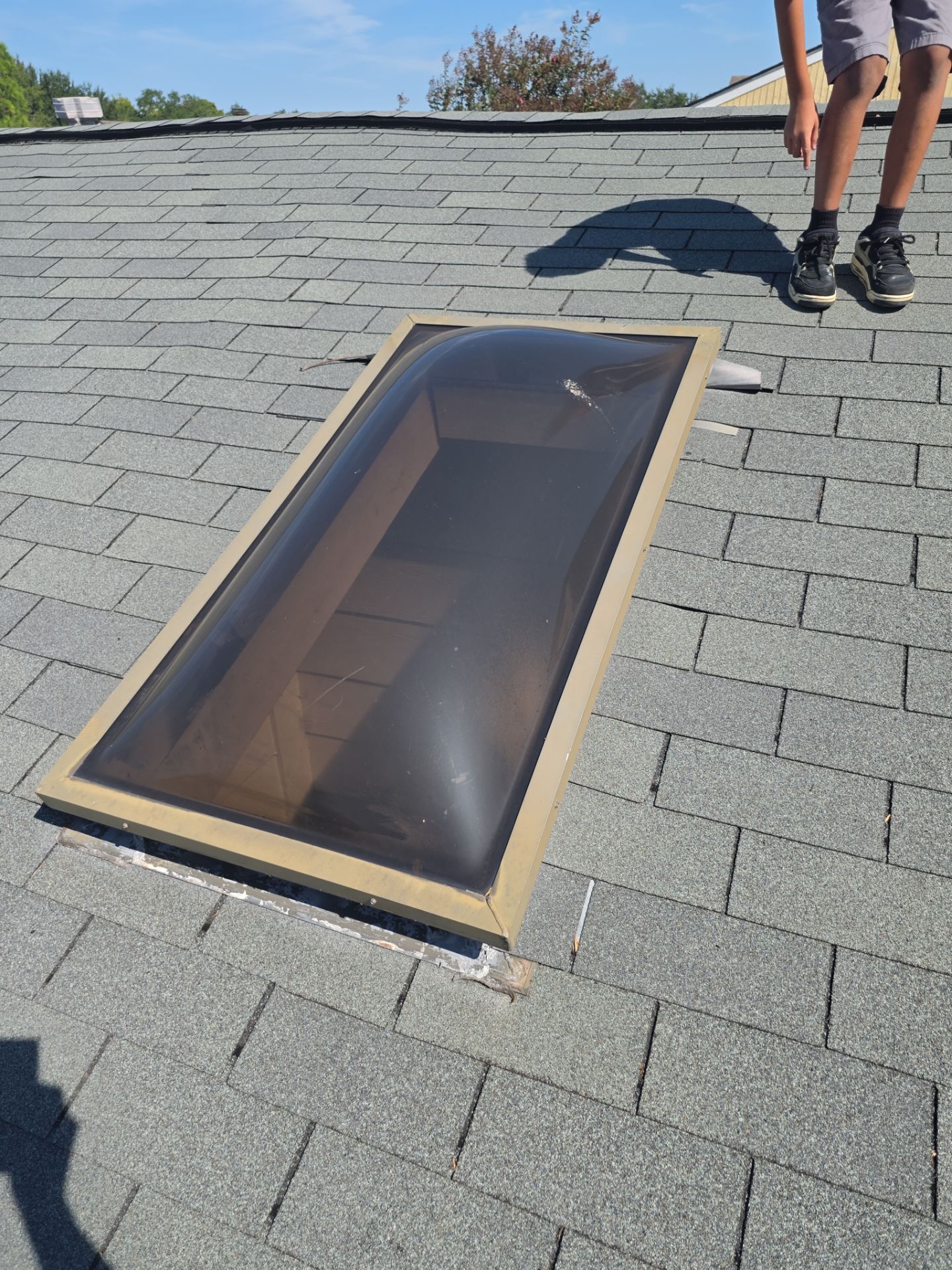 Asphalt Shingle Roof Repair and Skylight Sealing in Houston by One Legacy United
