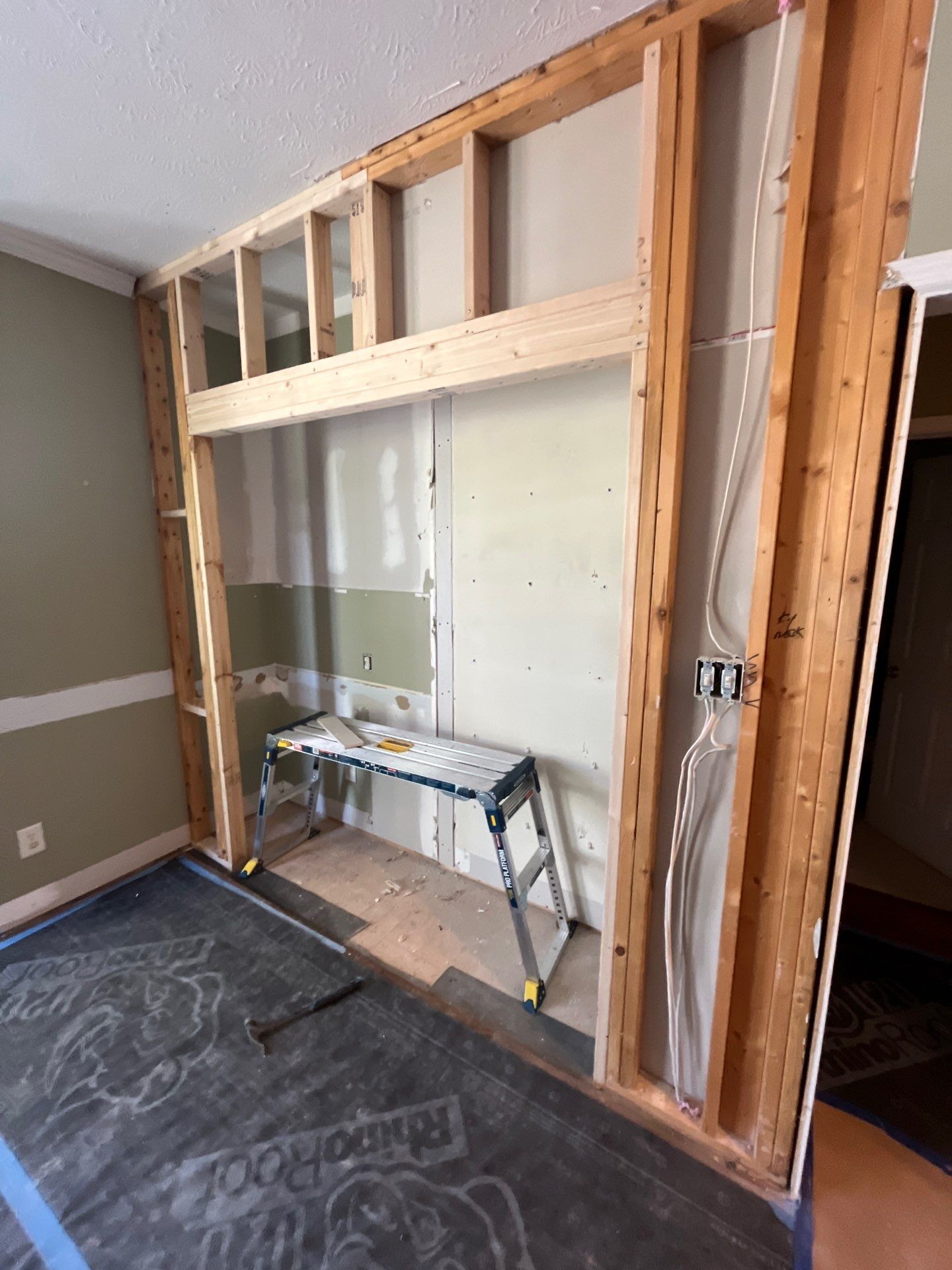 Complete Kitchen Renovation Featuring White Shaker Cabinetry in Fayetteville by Karcher Roofing & Construction