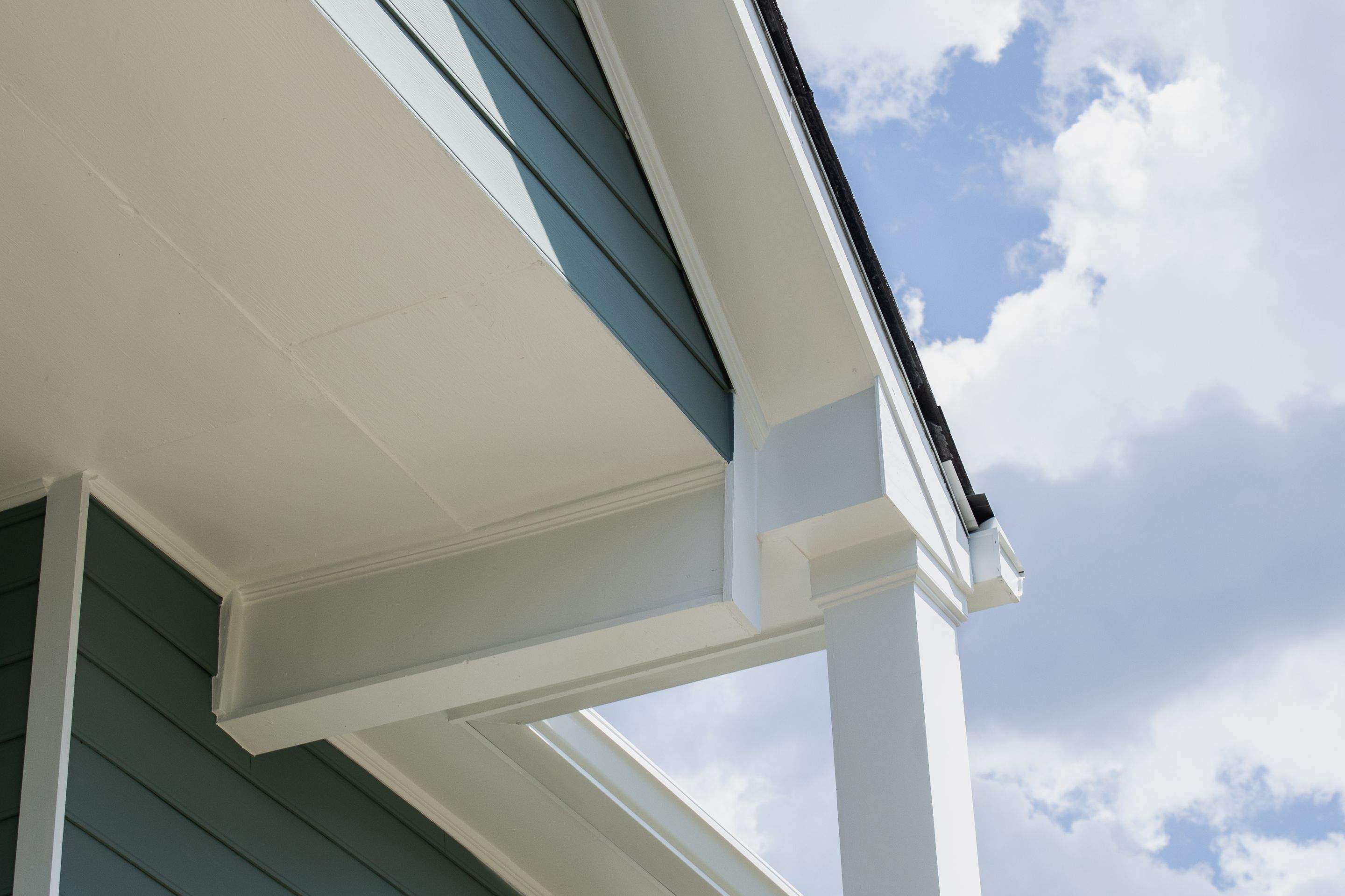 Alpharetta, GA Partial Siding Replacement, Porch Stain, and Exterior Painting by Nelson Exteriors 