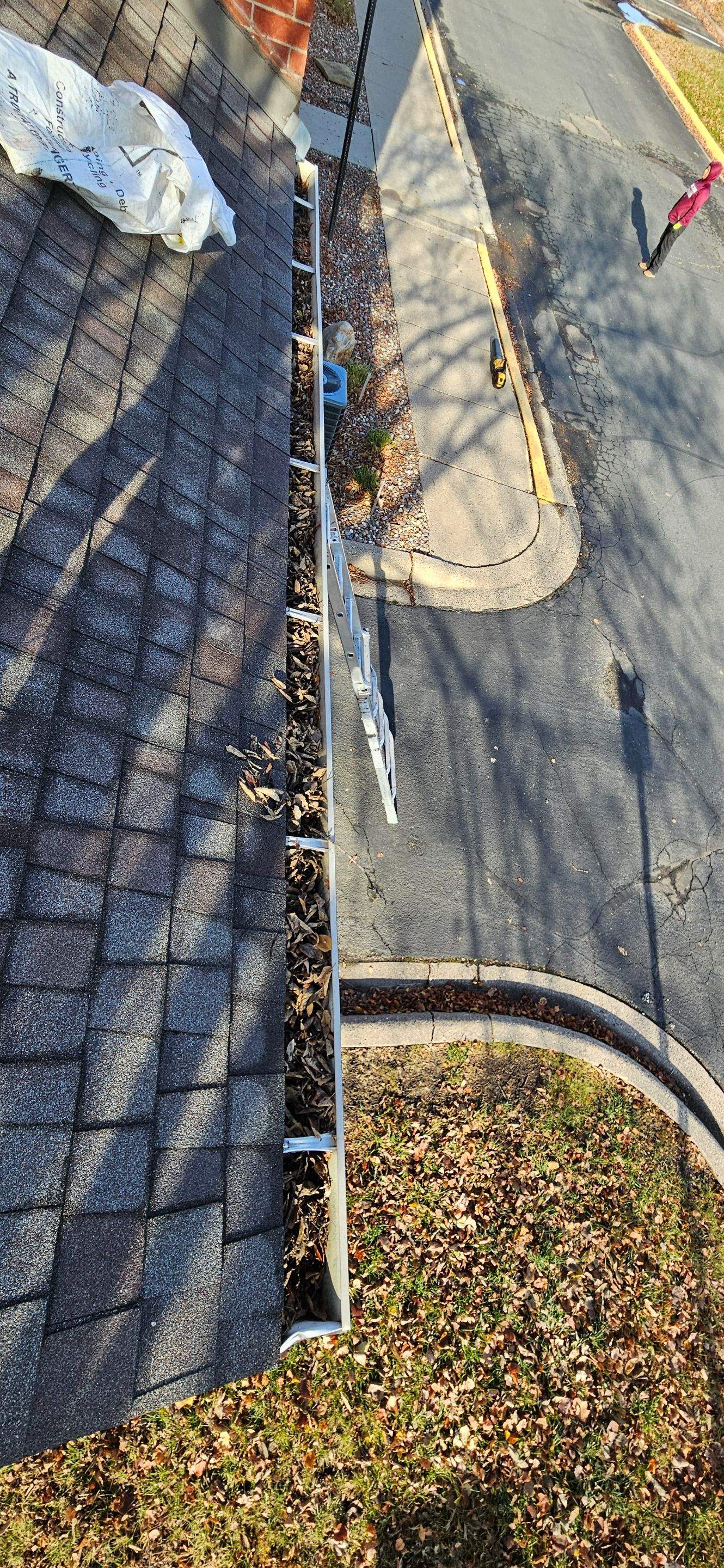 Commercial gutter cleaning Rochester before photo with filled gutters