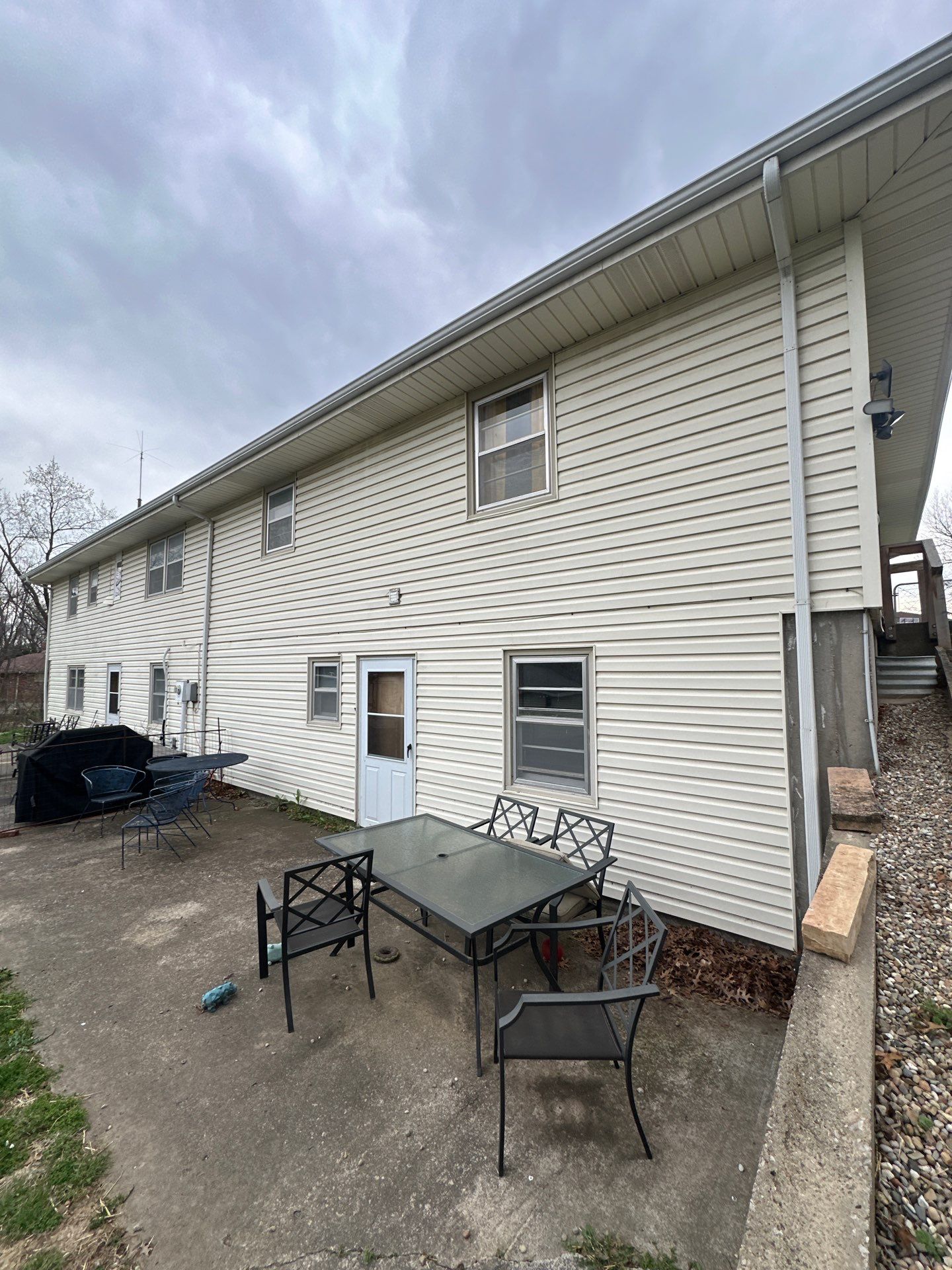 Indigo Board and Batten Siding and Window Replacement in Smithville by EEC Windows, Siding & Roofing