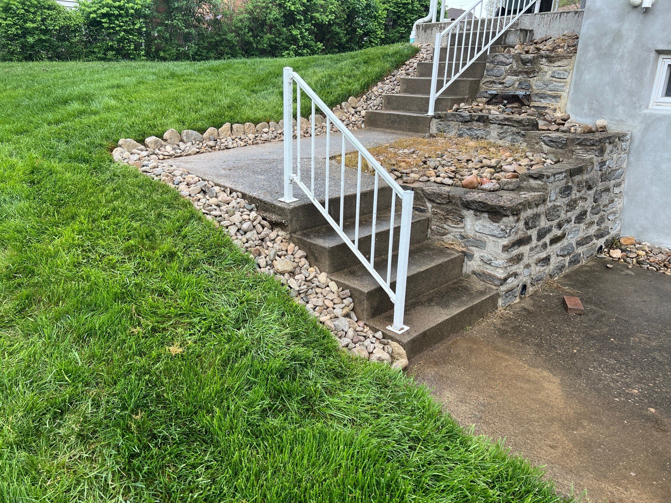 Wall Installation and Gravel Bed Creation by Reisenberg’s Lawn & Landscape, LLC