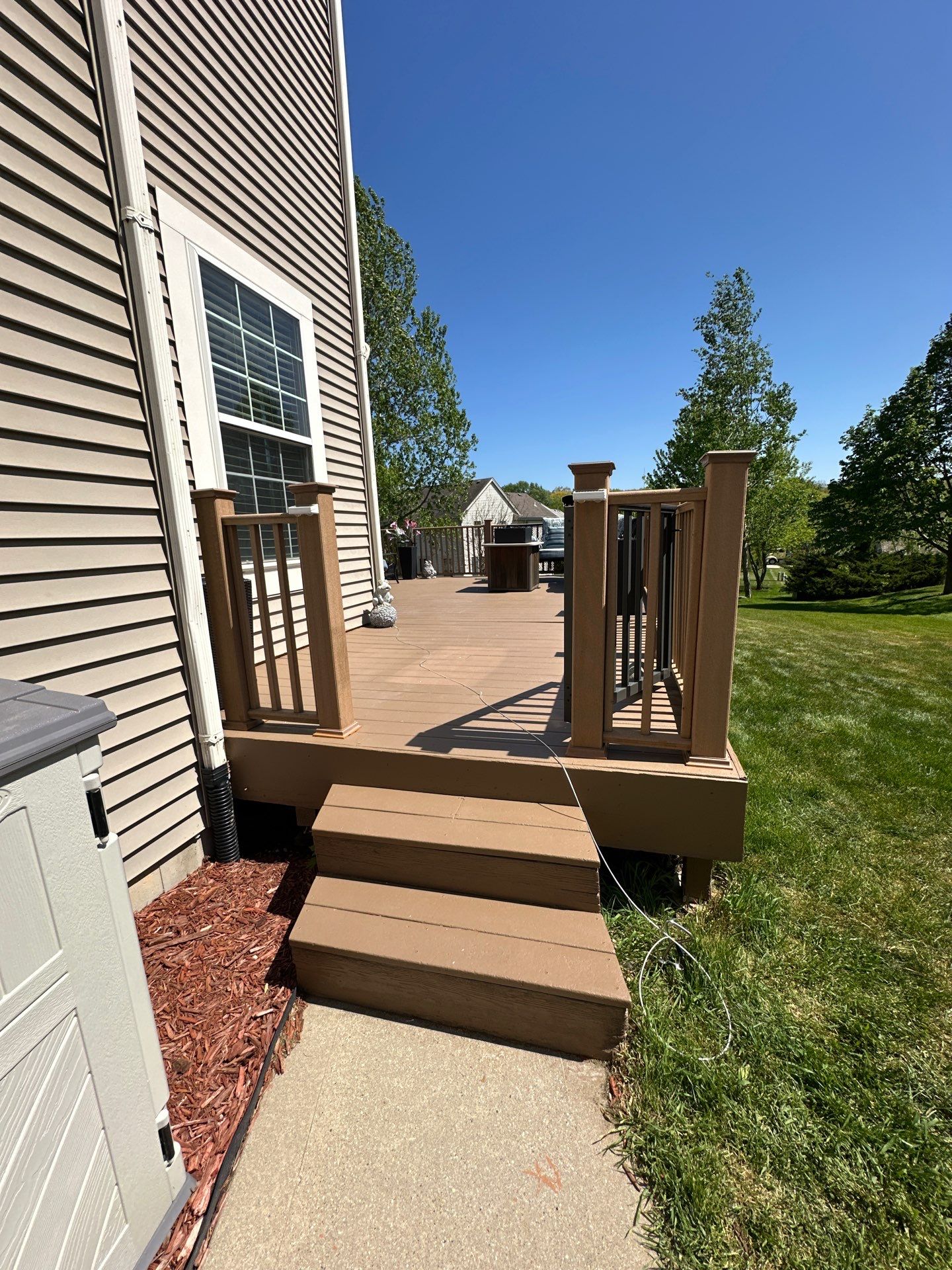 Elevated Wood Deck Refinishing and Railing Restoration in Waukesha by OCS Contracting Services