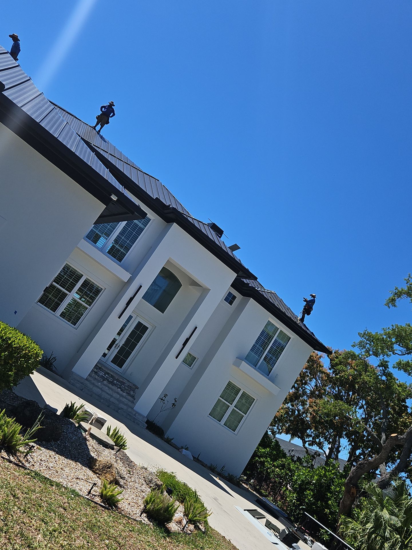 Soffit and Fascia Installation and black seamless gutters in Sarasota FL by Gutter Professors