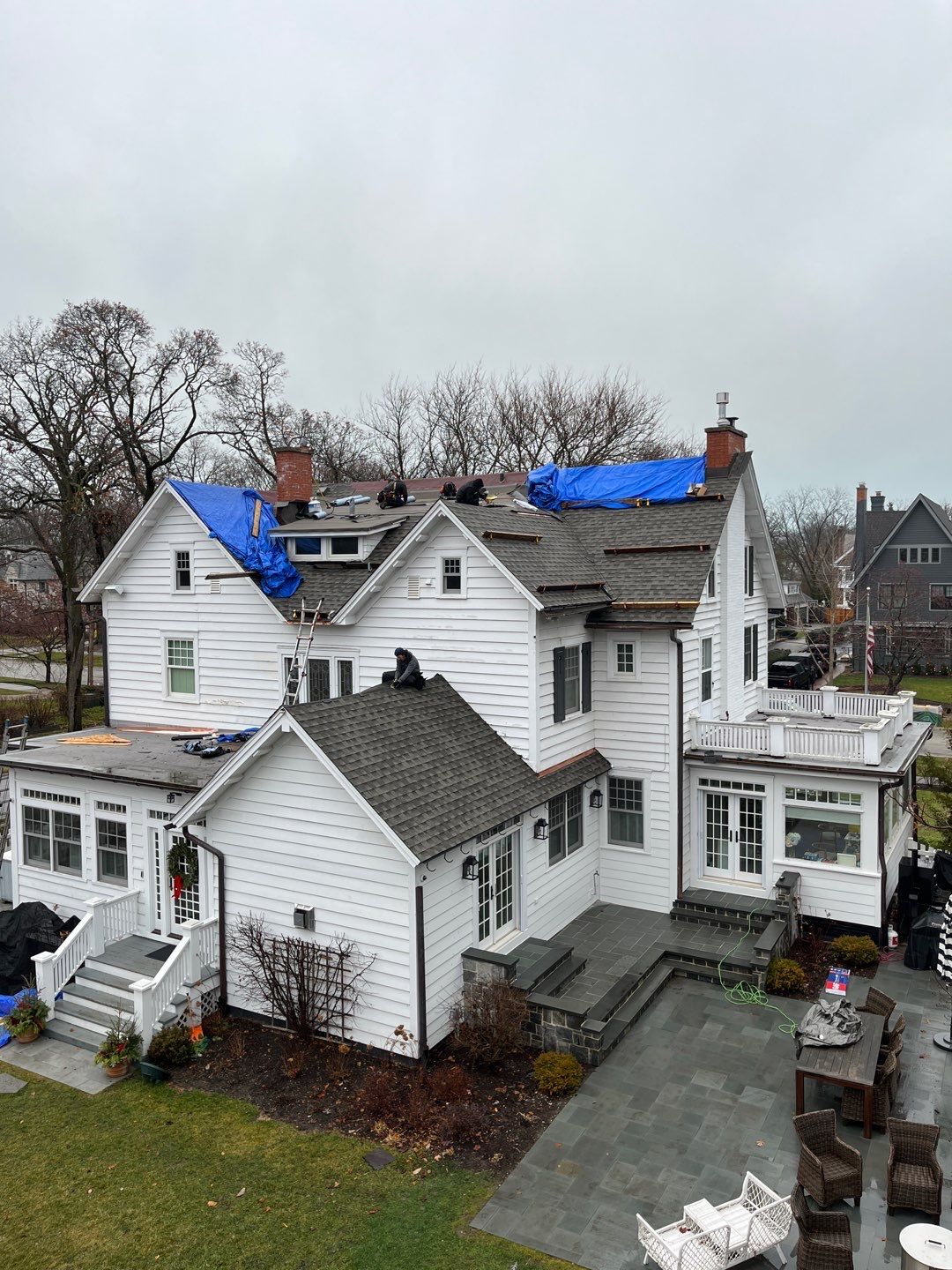 Asphalt Roof Replacement with Half Round Copper Gutter Installment by Custom Installations, Inc.