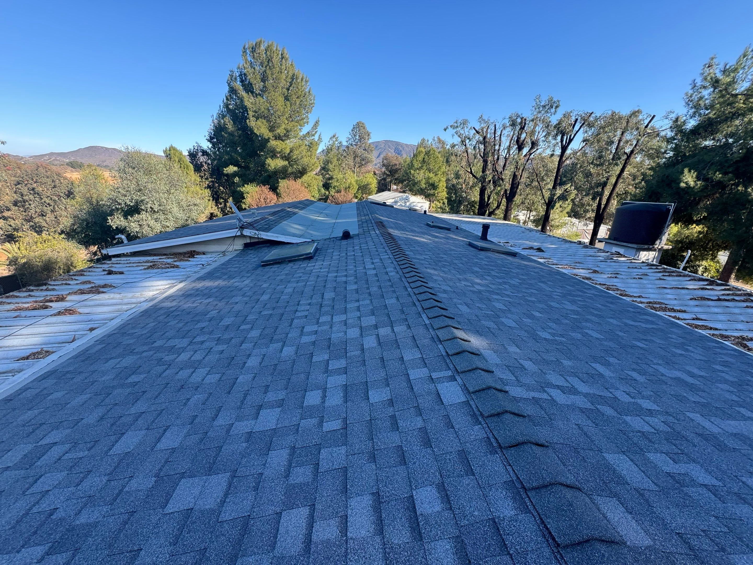 Temecula, CA | Correcting an Improperly Installed 2:12 Shingle Roof on a Mobile Home by Zenith Roofing Services
