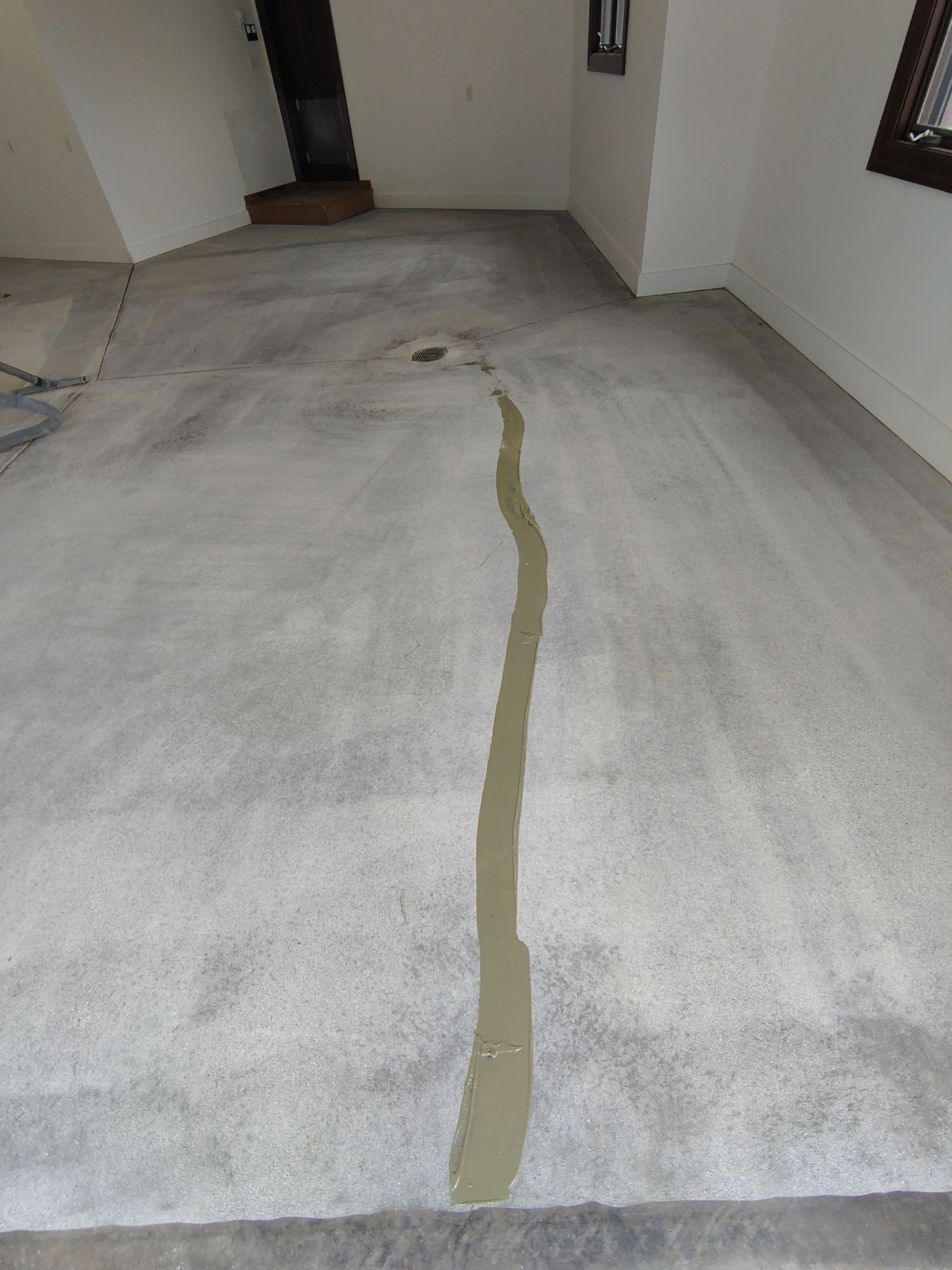 Feather Grey Floor Coating in Sioux Falls, SD by Select Painting, Coatings & Garage Cabinets