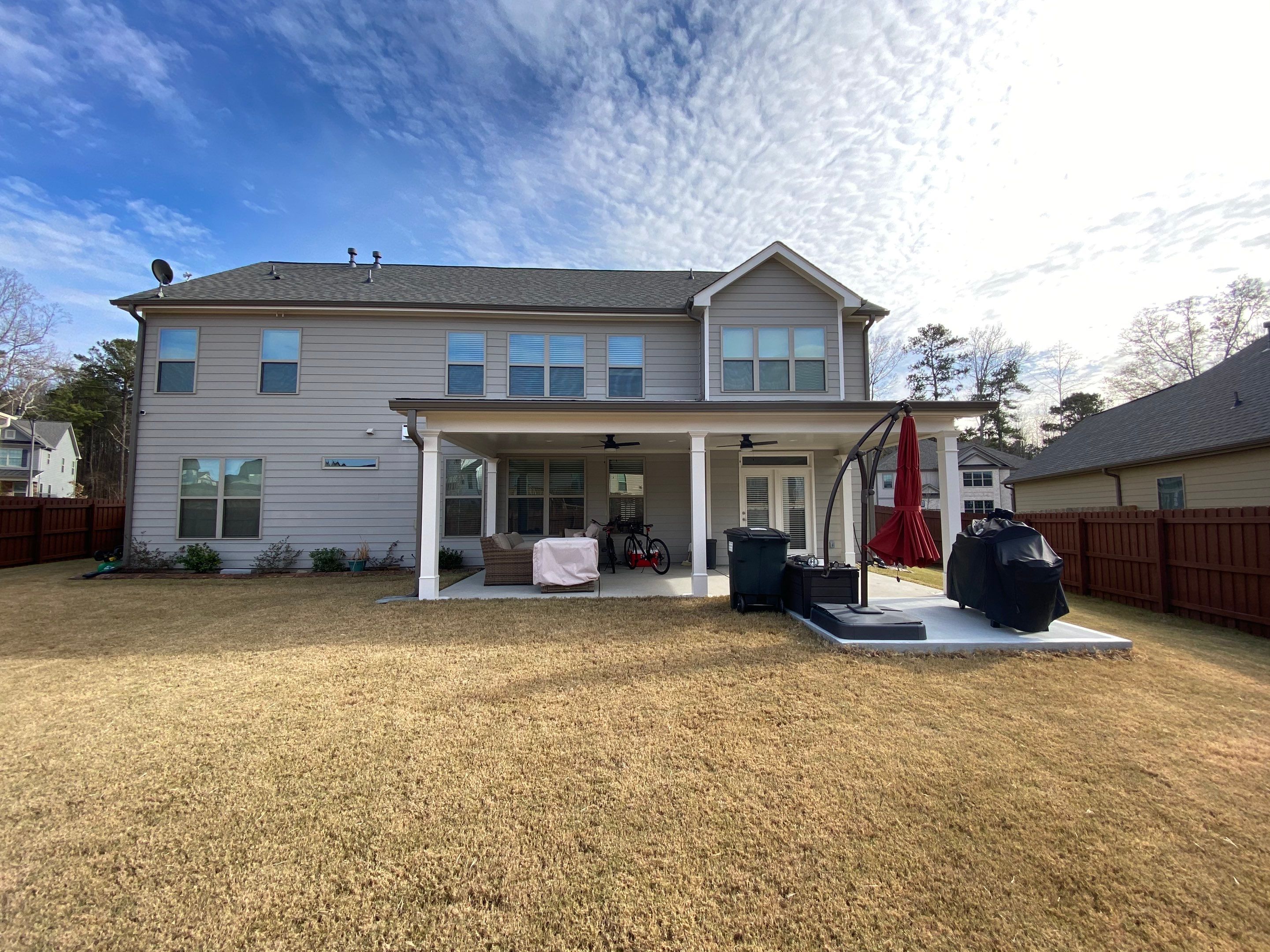 Custom Covered Porch with Beadboard Ceiling in Marietta by Swift Home Renovations