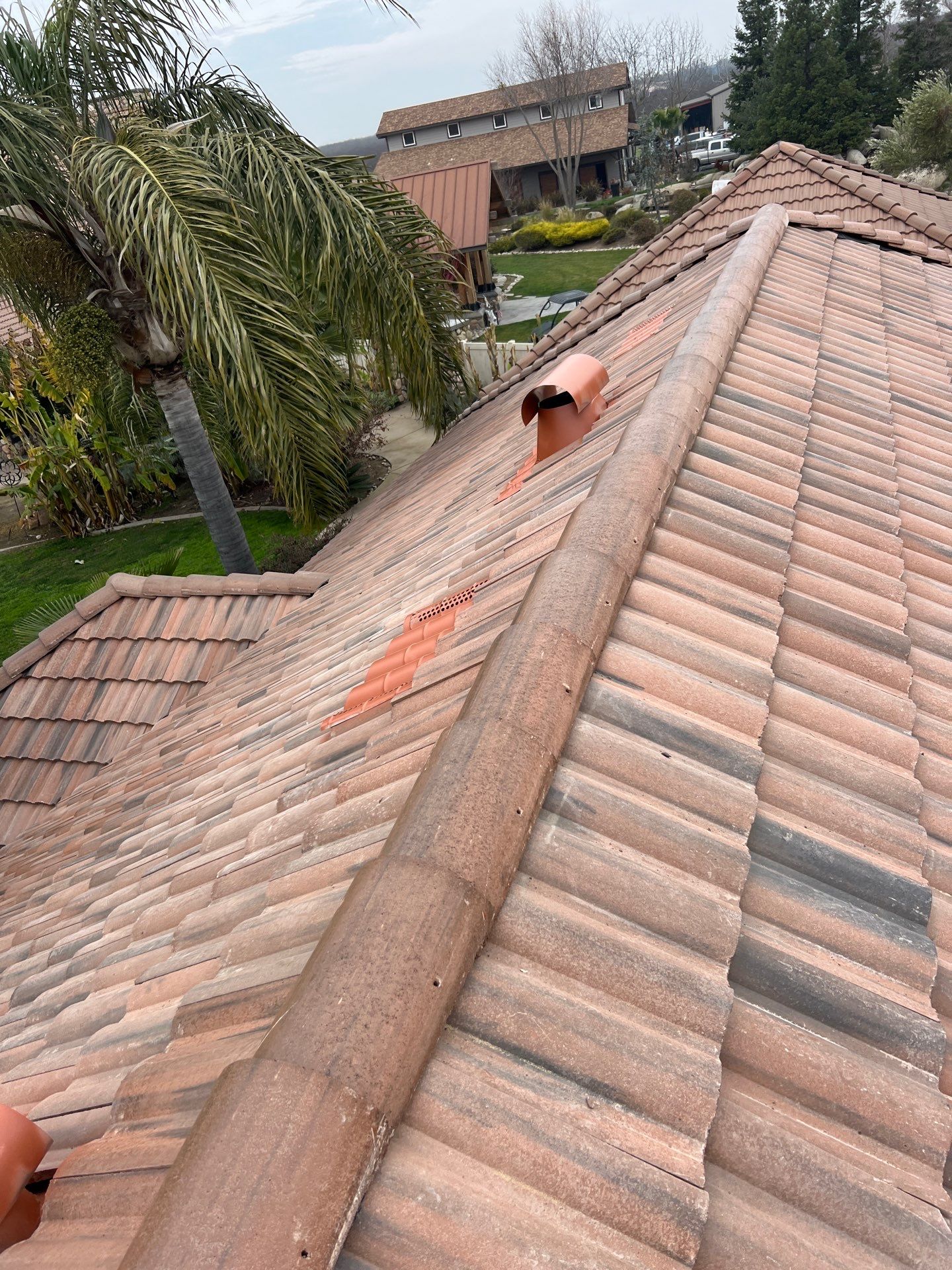 Tile, Metal, and TPO roofing project (new construction) by Straight Edge Roofing Inc