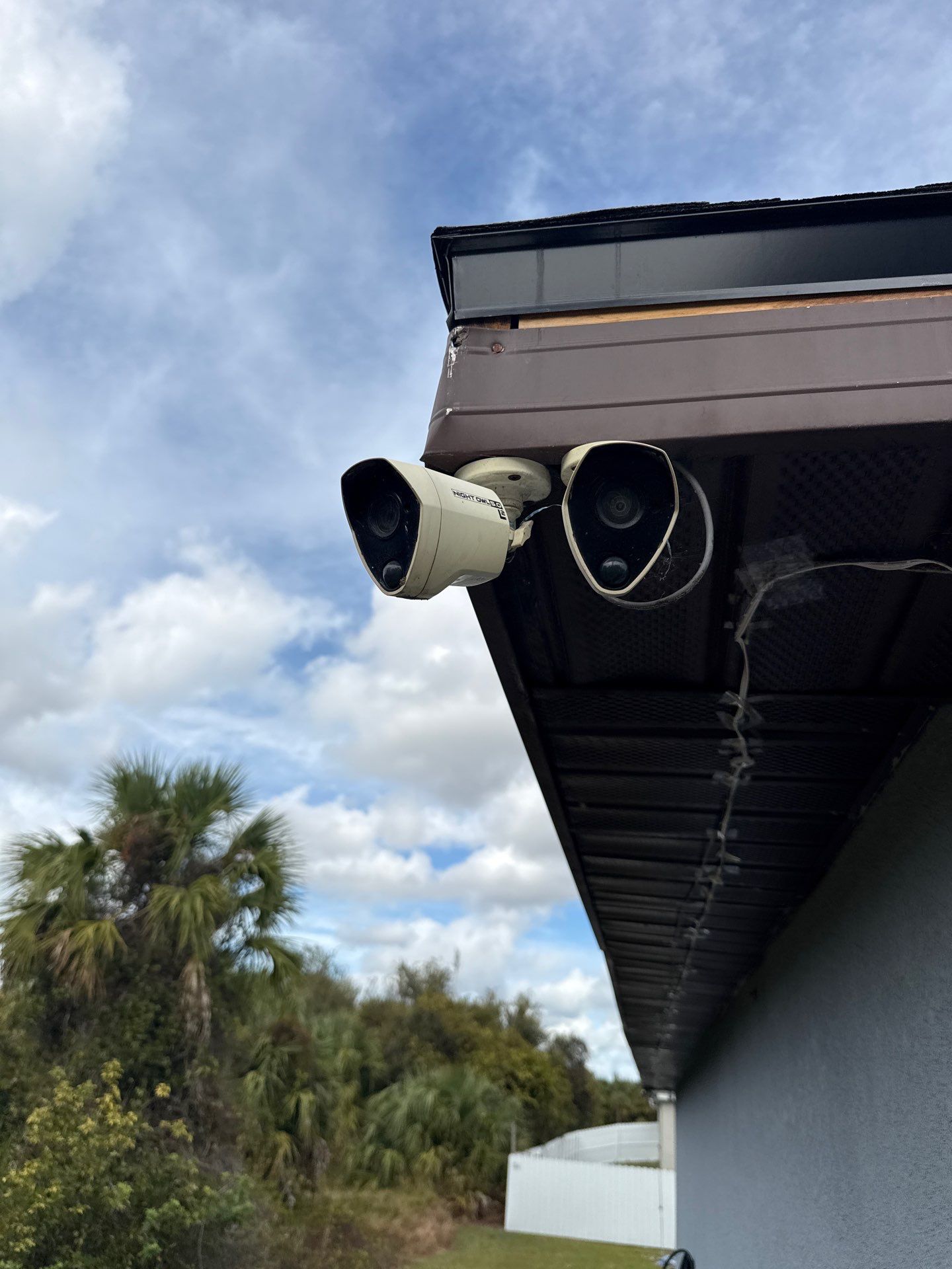 Black Seamless Gutters & Soffit/Fascia in Lehigh Acres FL by Gutter Professors