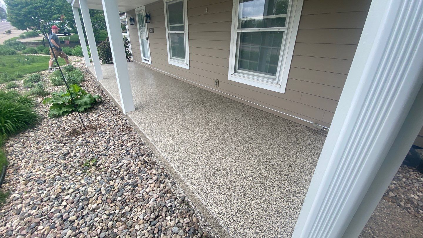 Patio using Cordwood by Select Painting, Coatings & Garage Cabinets