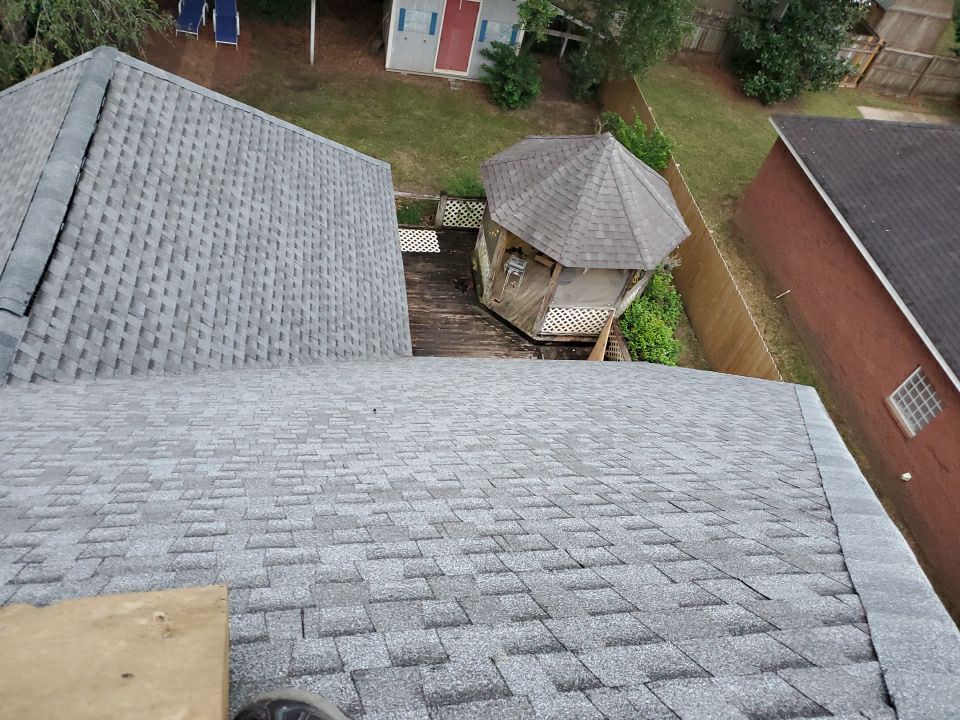 Residential Roofing Installation using Roof Replacement by American Roofing & Construction LLC