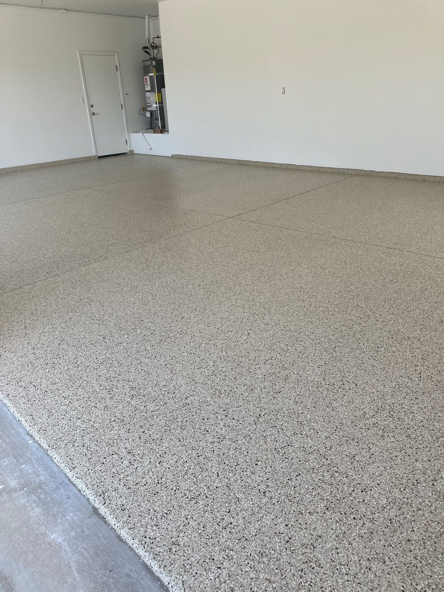 San Luis Obispo Garage Floor Polyurea Coating with Driftwood Flakes by MGP Coatings
