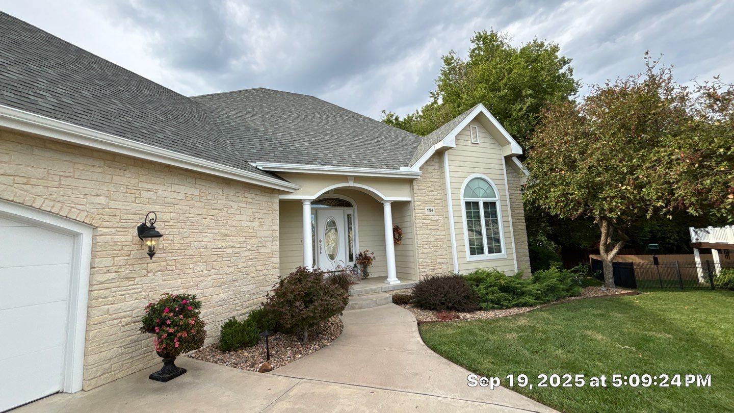 Storm Damaged Roof & Gutter Replacement by Eaton Roofing