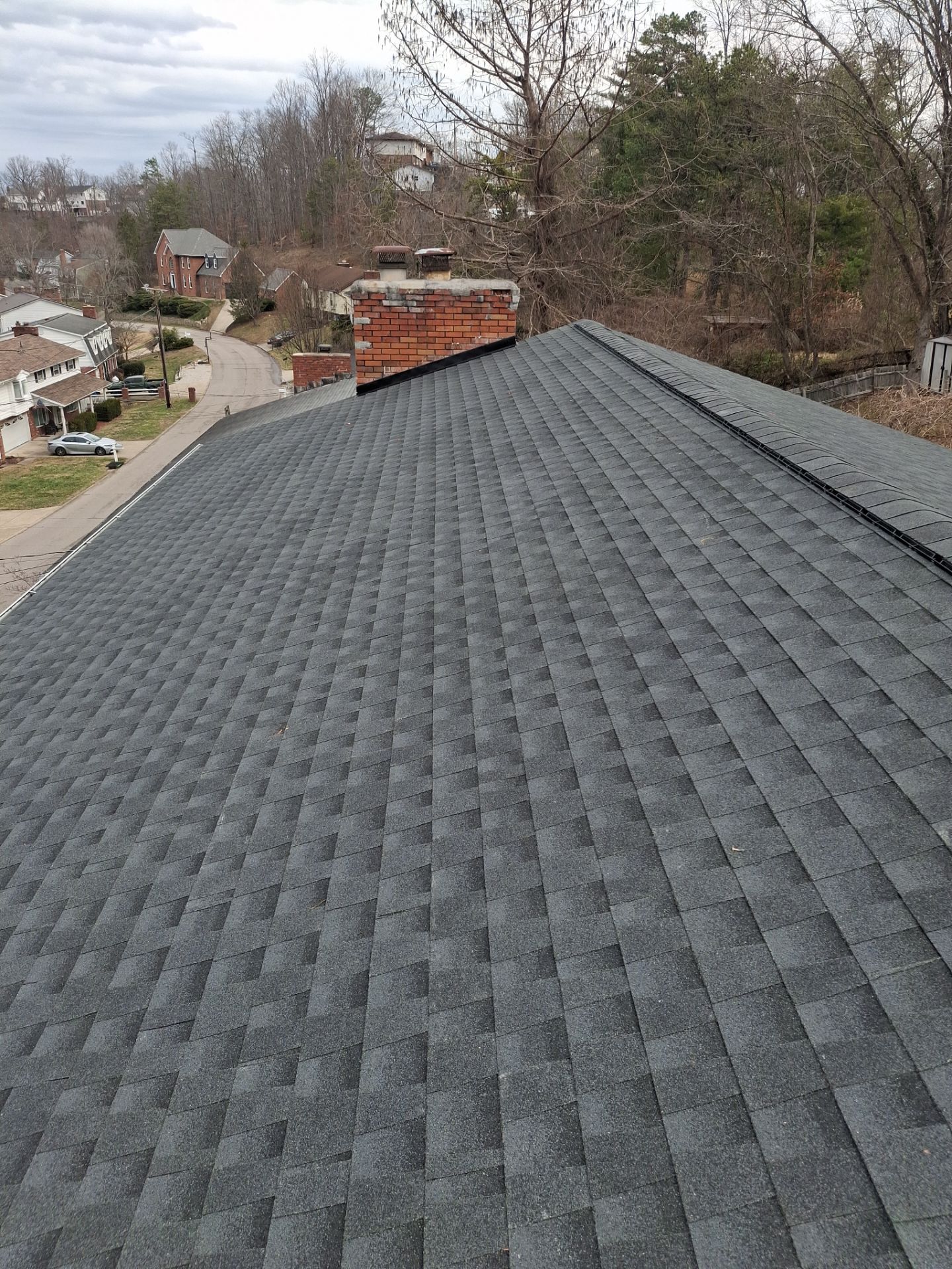 Residential Roofing Installation using GAF Timberline HDZ Charcoal by Rainstoppers Roofing