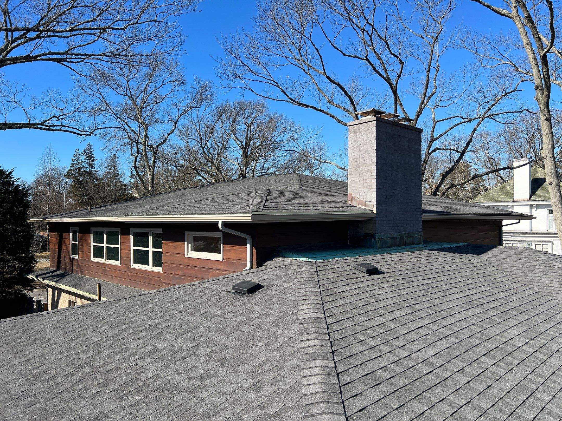 Pewterwood Roofs by Pinnacle Roofing & Skylights