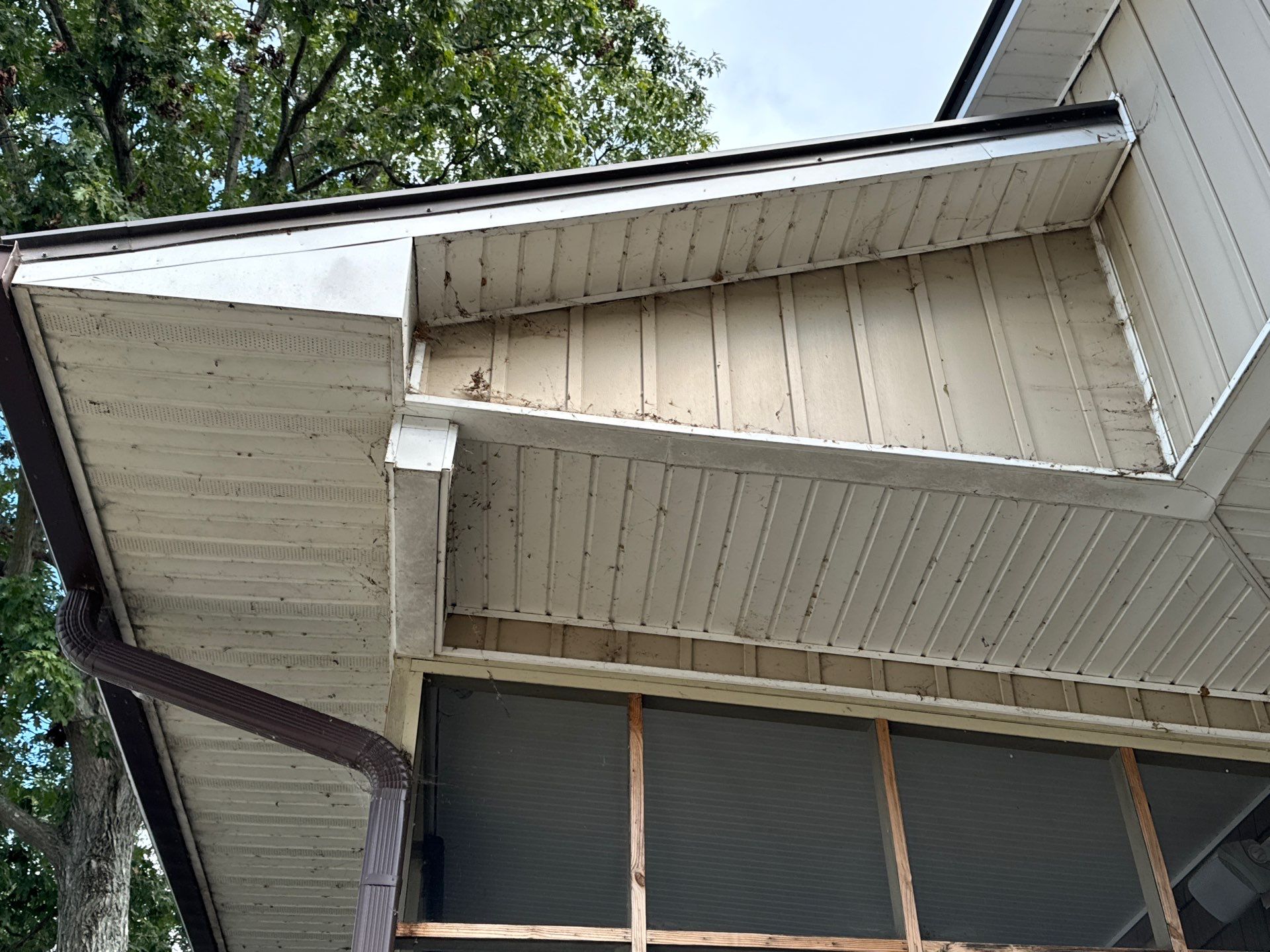 pressure washing of exterior soffits and roof edges to remove dirt and debris from surfaces