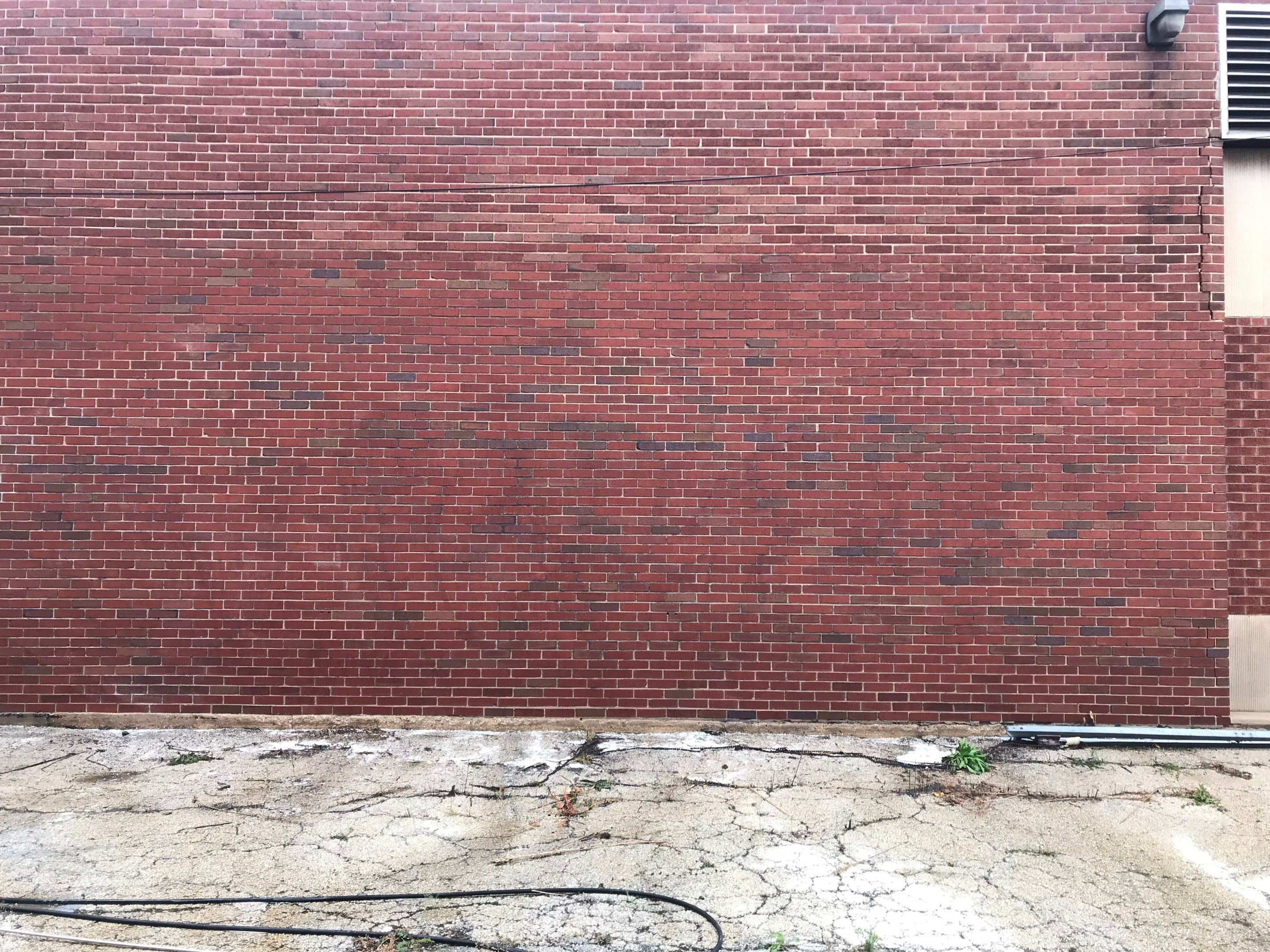 Graffiti removal  using Graffiti remover by Northern Power Washing LLC.