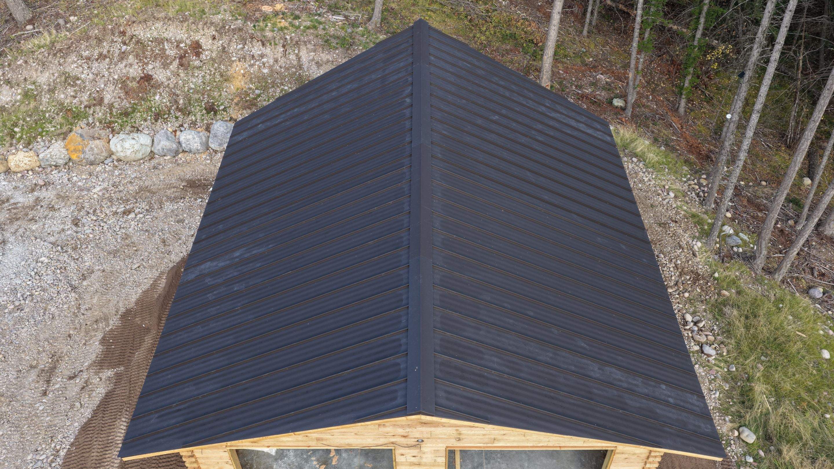 Mechanical Lock Standing Seam - CMG ULG Dark Bronze  by Montana Roofing Solutions