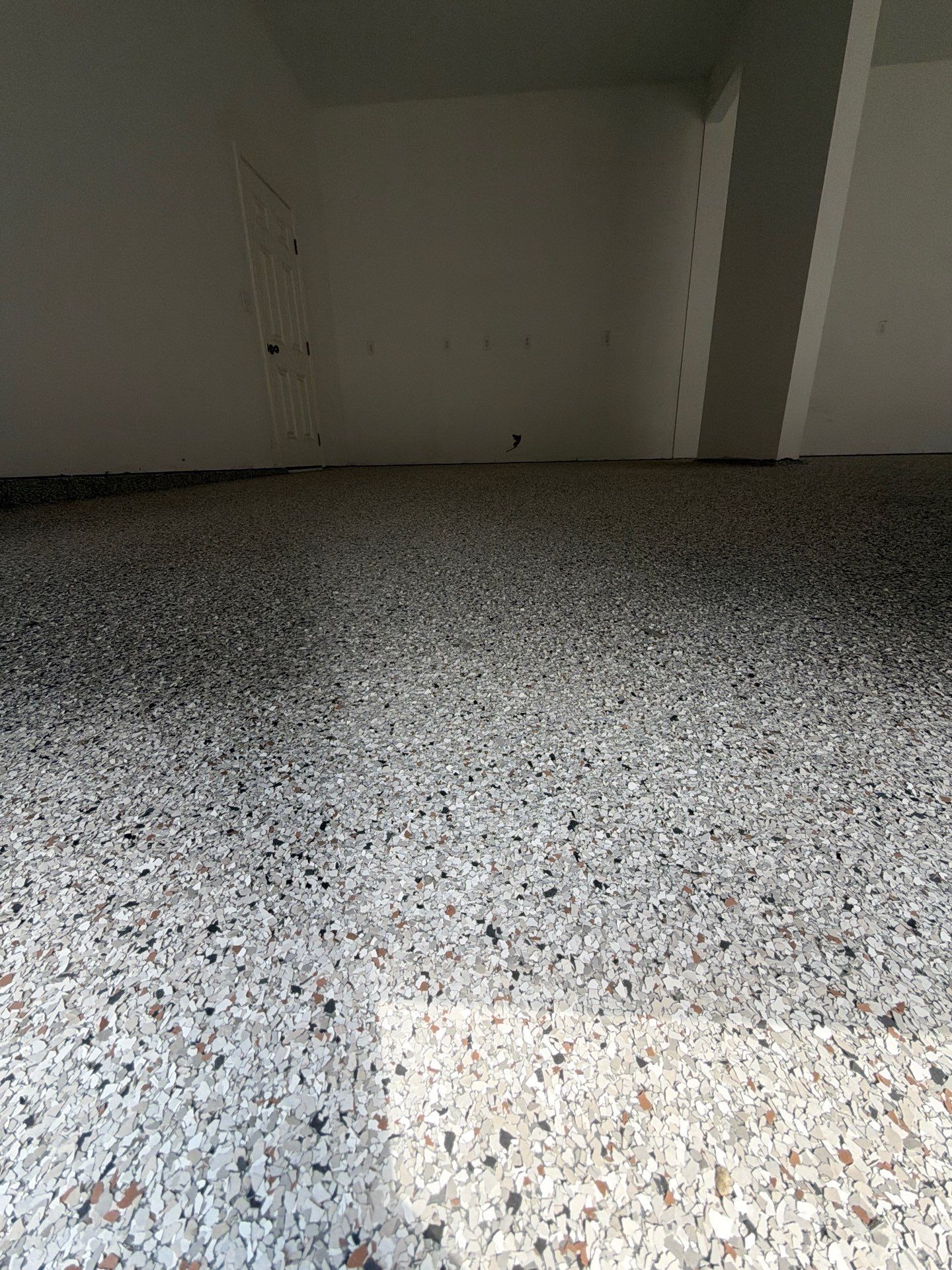 Multi-Car Garage Epoxy Flake Floor Installation in Byron Center by Gordon Painting