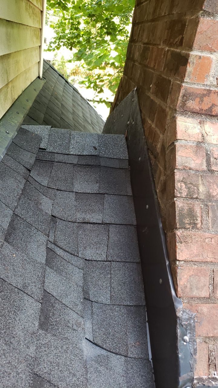 Residential Roofing Installation using Roof Replacement by American Roofing & Construction LLC