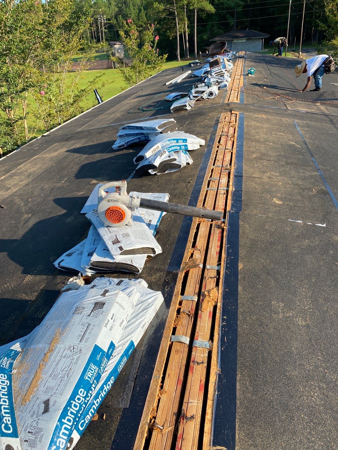 Commercial Roofing Installation using Roof Replacement by American Roofing & Construction LLC