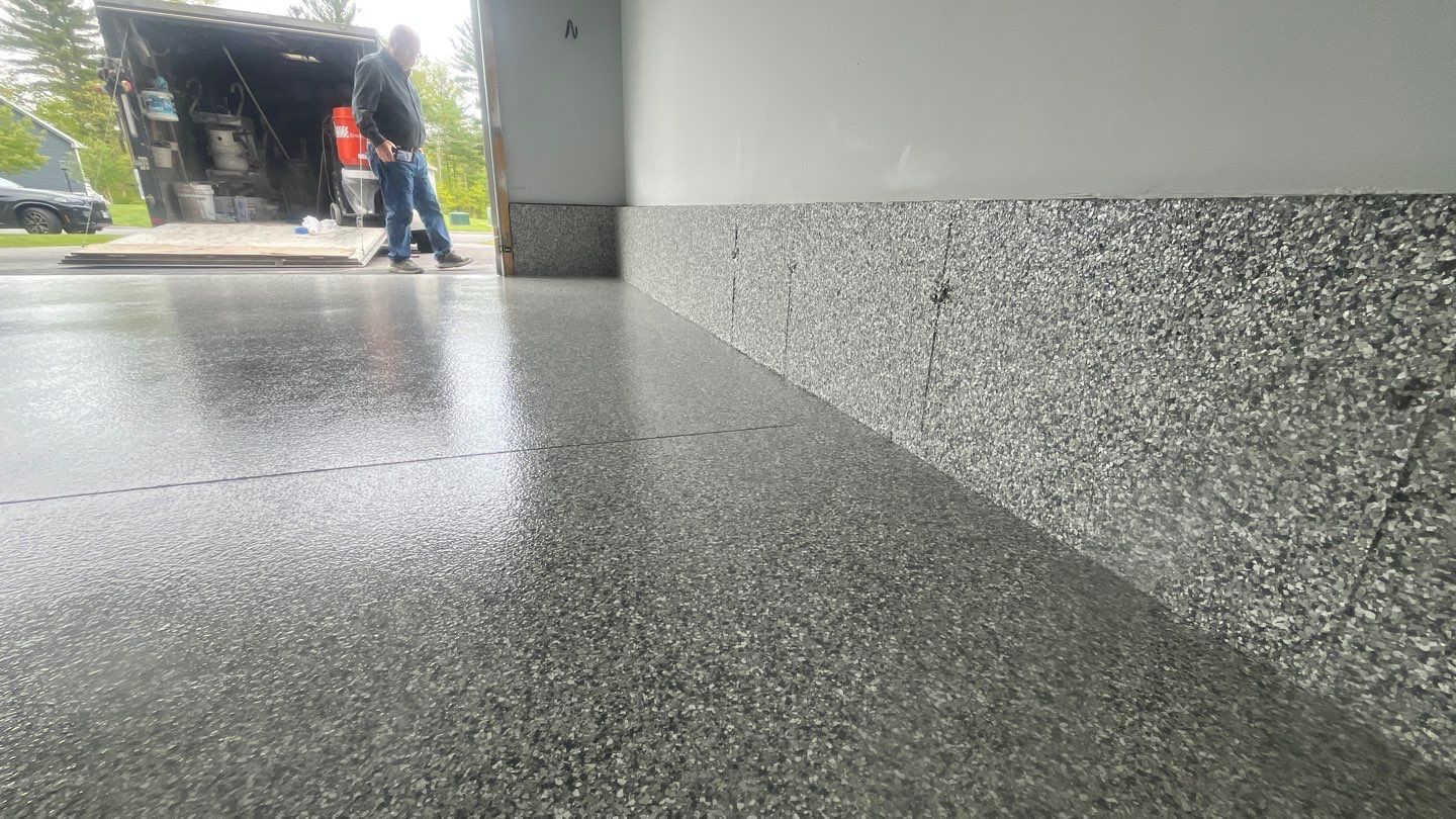 Garage in Londonderry, NH 03053 by Symphony Concrete Coatings