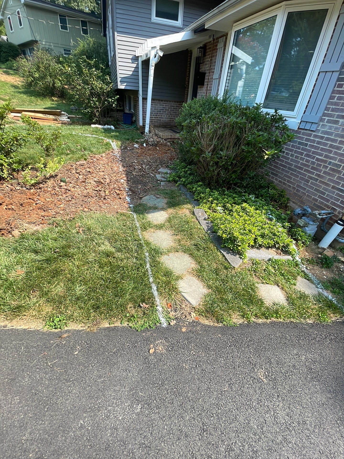 New walkway with stairs and a new front porch by Fairfax Contractors, LLC